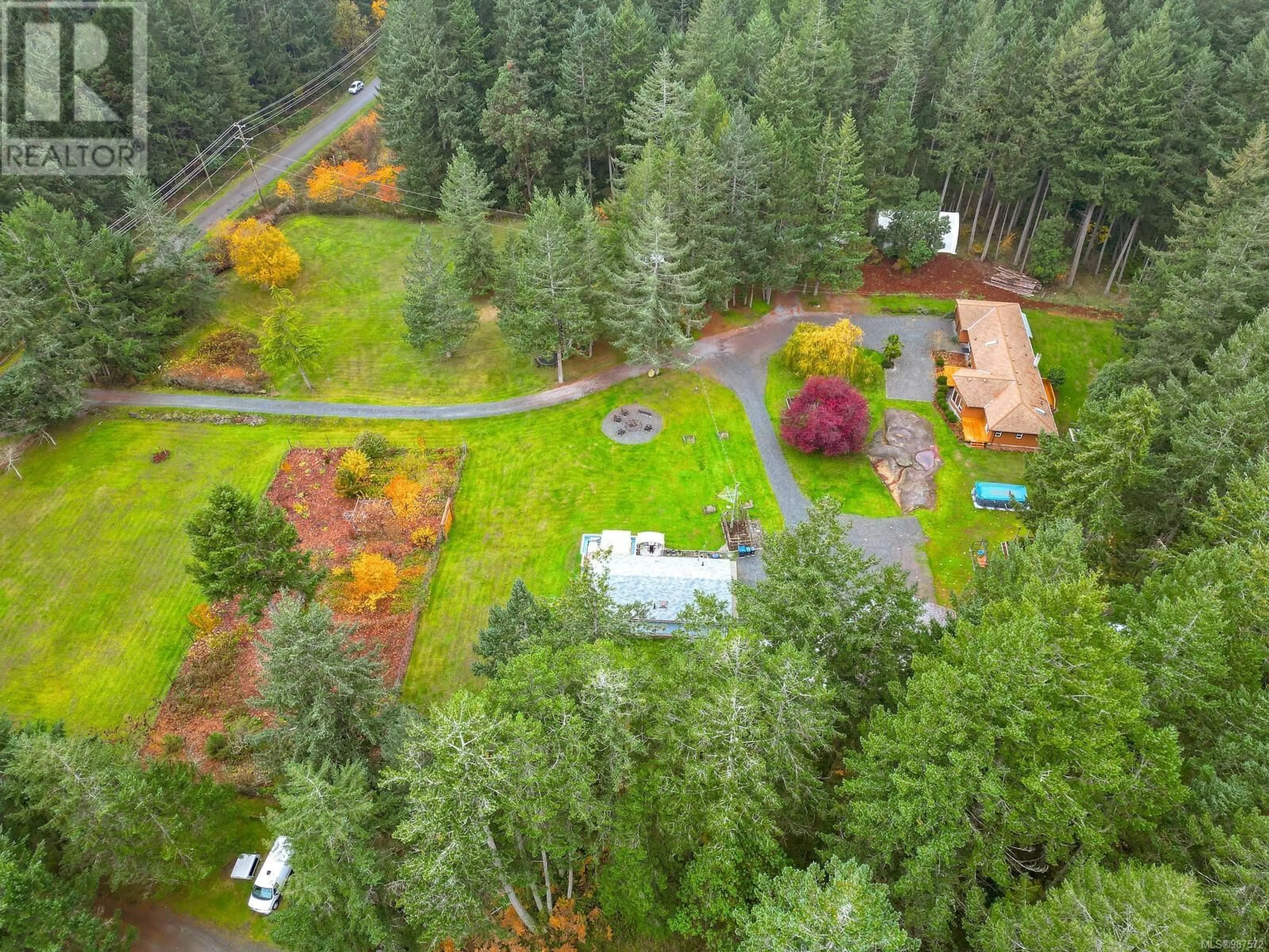 A pic from outside/outdoor area/front of a property/back of a property/a pic from drone, forest/trees view for 2730 Cedar Heights Cres SW, Nanaimo British Columbia V9X1N9