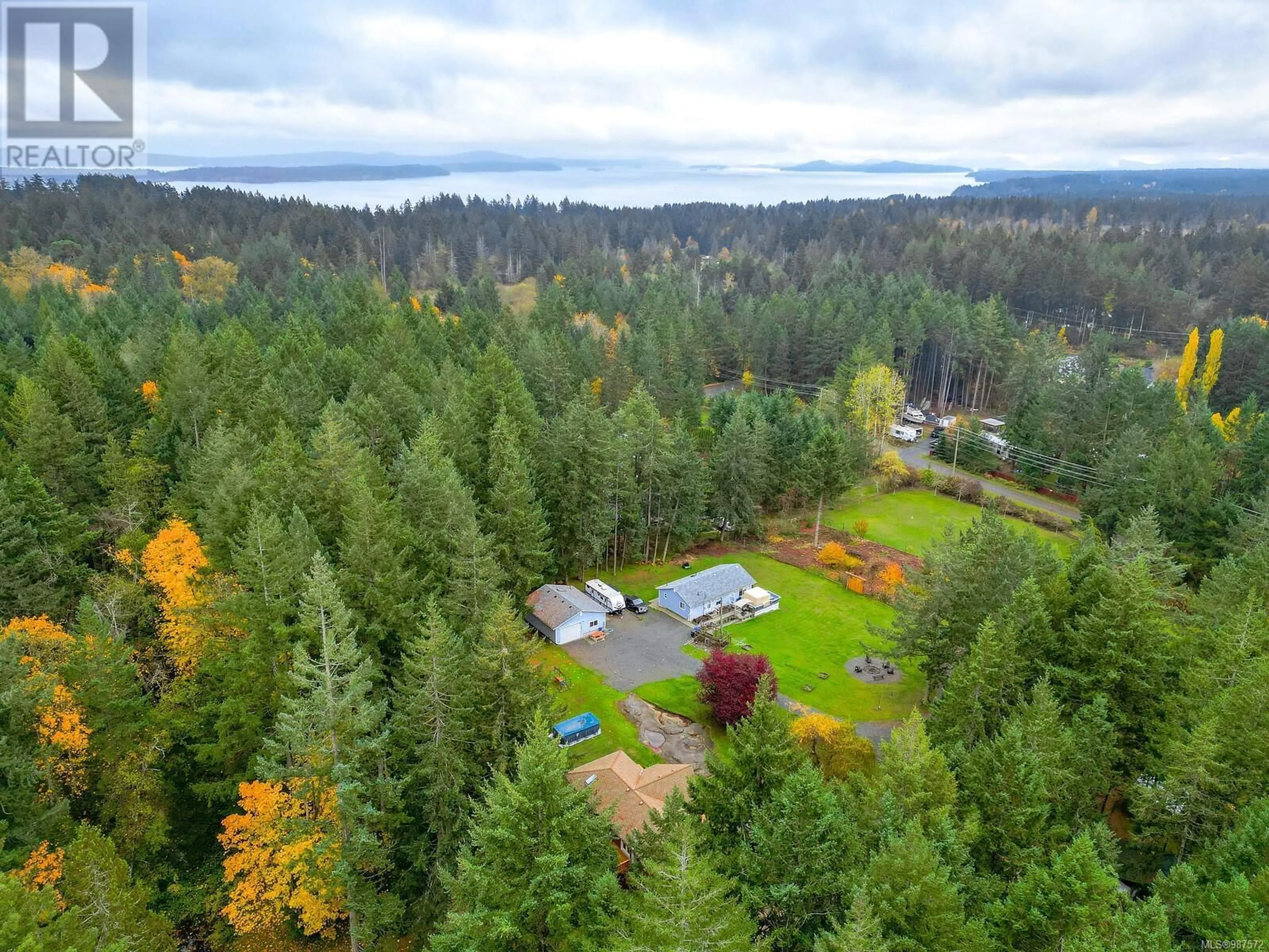 A pic from outside/outdoor area/front of a property/back of a property/a pic from drone, forest/trees view for 2730 Cedar Heights Cres SW, Nanaimo British Columbia V9X1N9