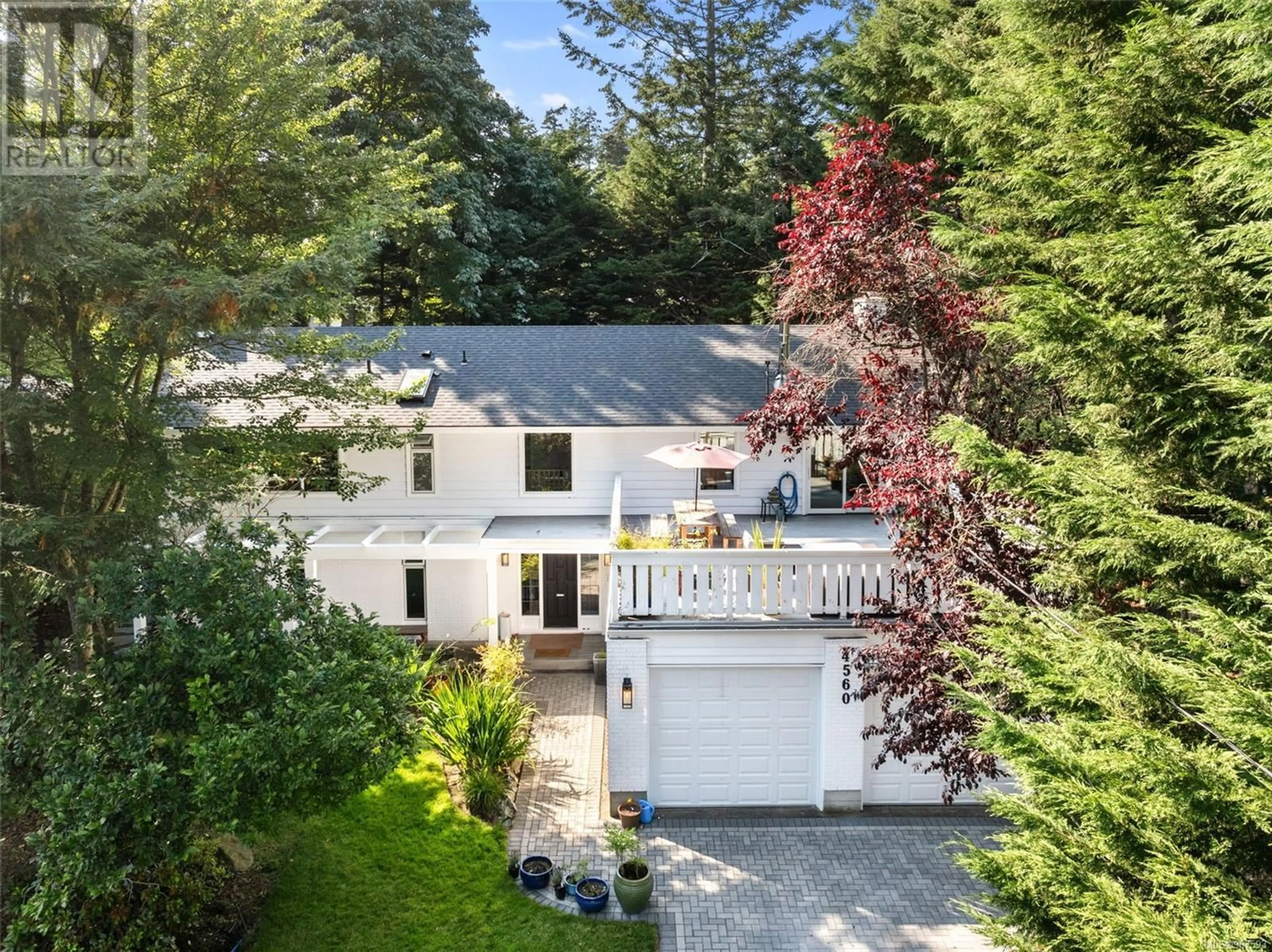 A pic from outside/outdoor area/front of a property/back of a property/a pic from drone, street for 4560 Balmacarra Rd, Saanich British Columbia V8N3W3