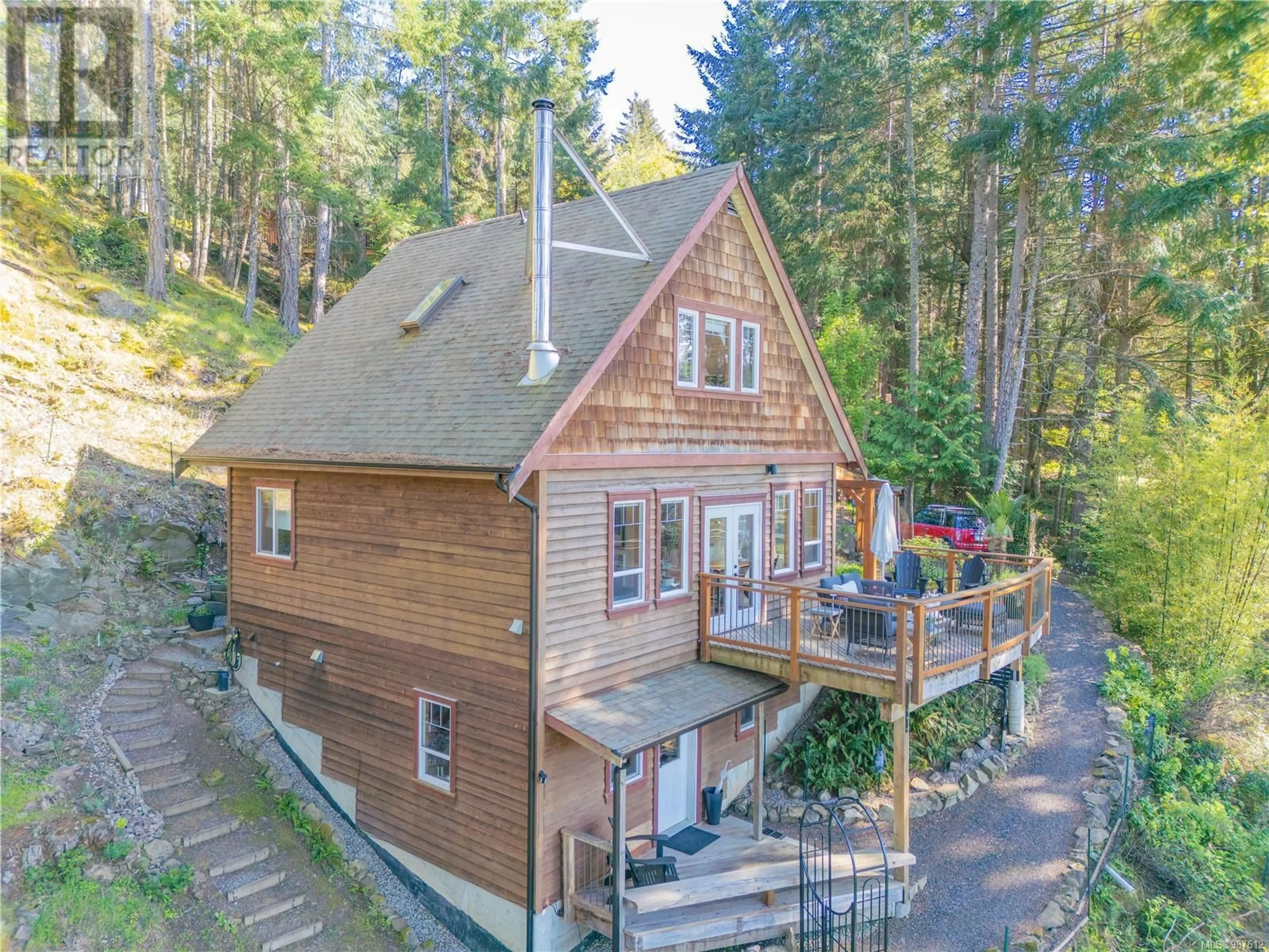 A pic from outside/outdoor area/front of a property/back of a property/a pic from drone, unknown for 3711 COMPASS CRESCENT, Pender Island British Columbia V0N2M2