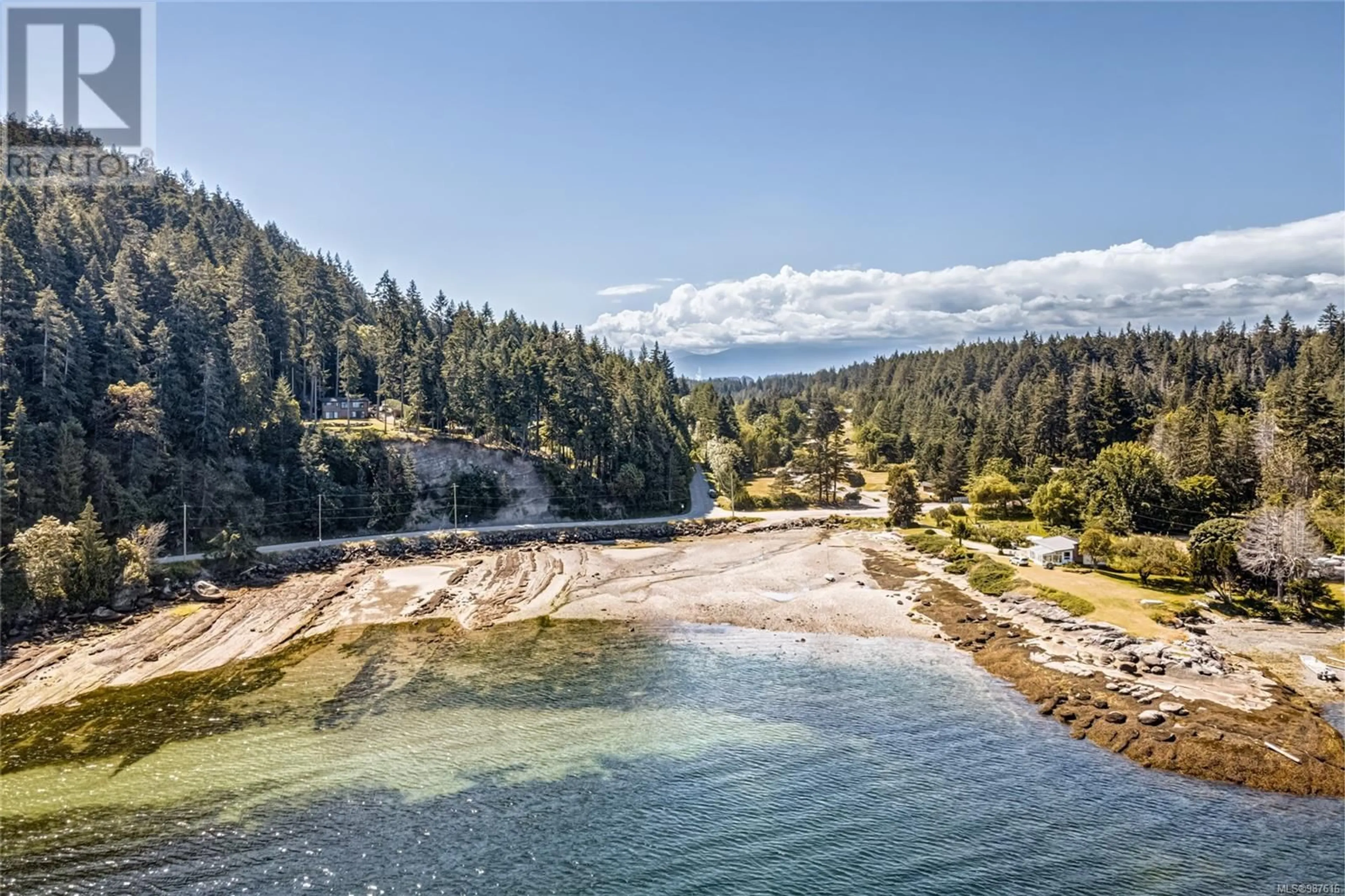 A pic from outside/outdoor area/front of a property/back of a property/a pic from drone, water/lake/river/ocean view for 215 Easthom Rd, Gabriola Island British Columbia V0R1X2