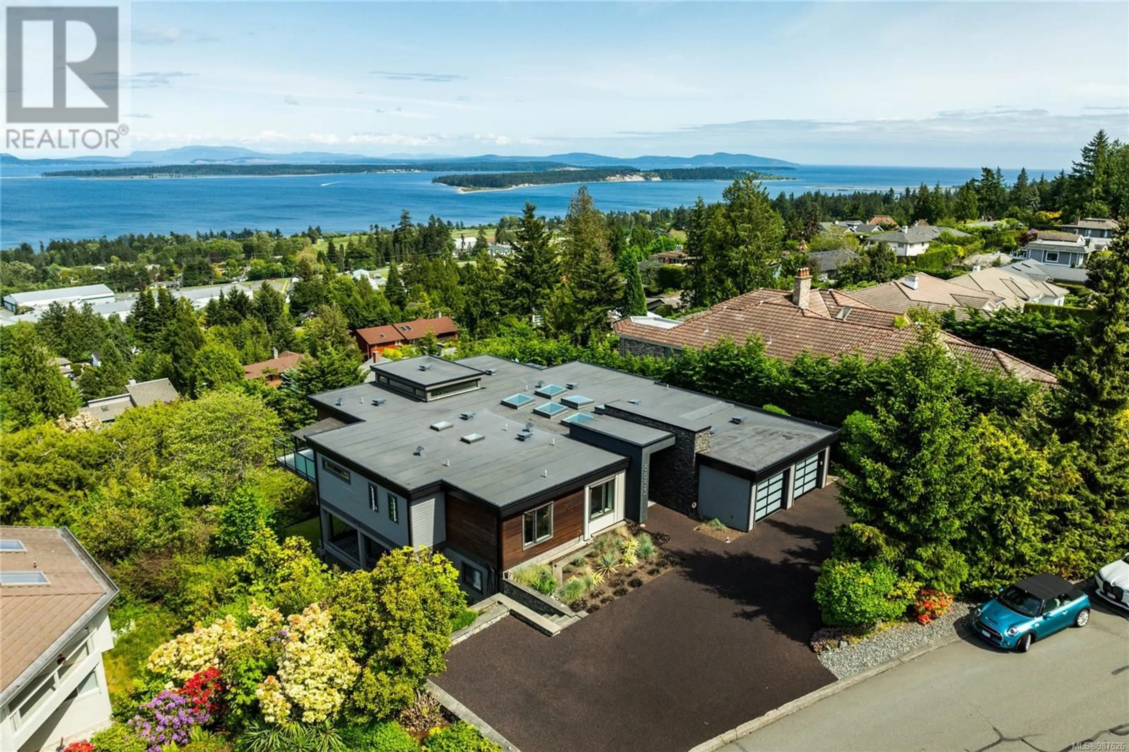 A pic from outside/outdoor area/front of a property/back of a property/a pic from drone, water/lake/river/ocean view for 8853 Park Pacific Terr, North Saanich British Columbia V8L4S1