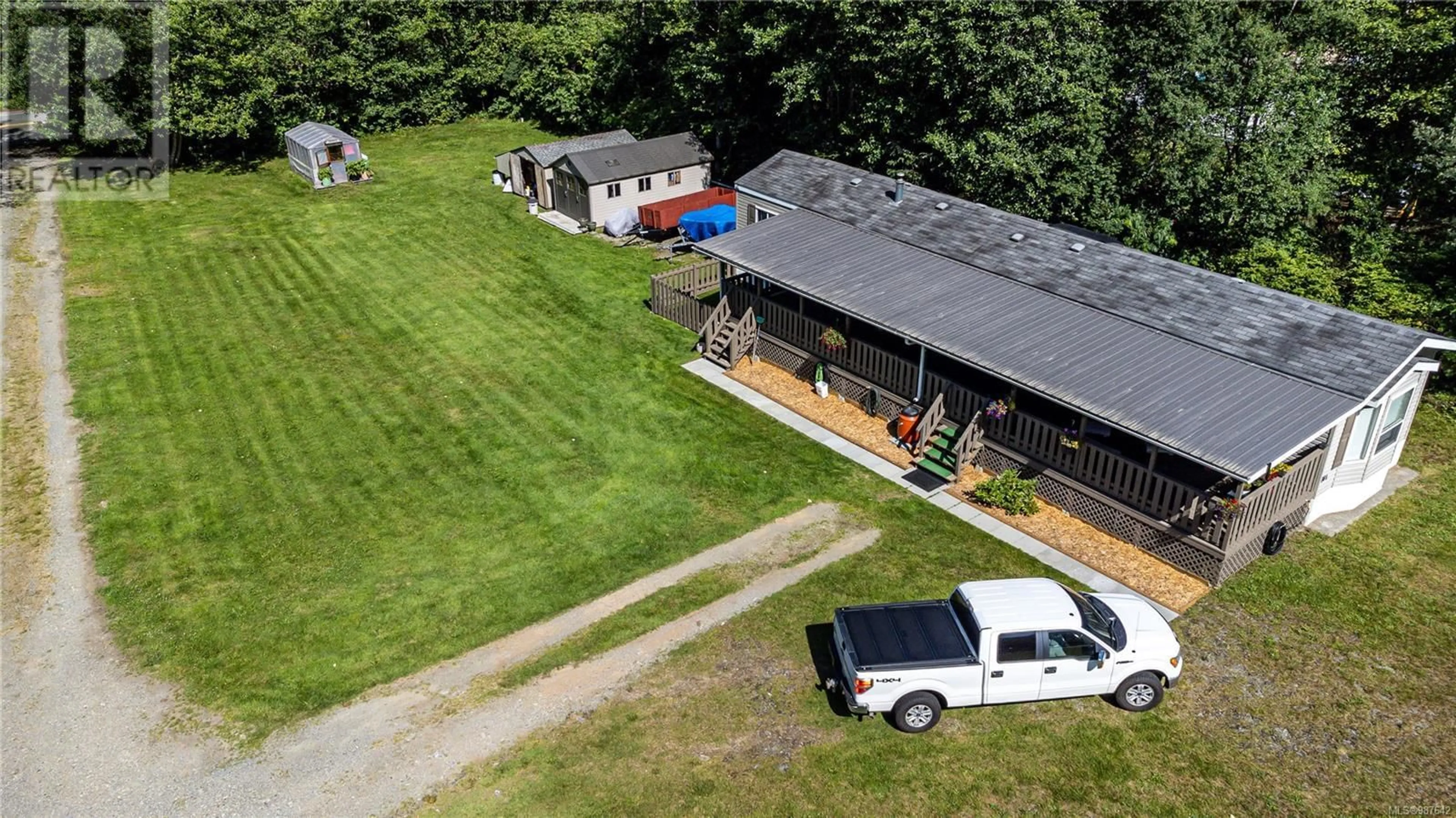 A pic from outside/outdoor area/front of a property/back of a property/a pic from drone, unknown for 701 Kelsey Way, Sayward British Columbia V0P1R0