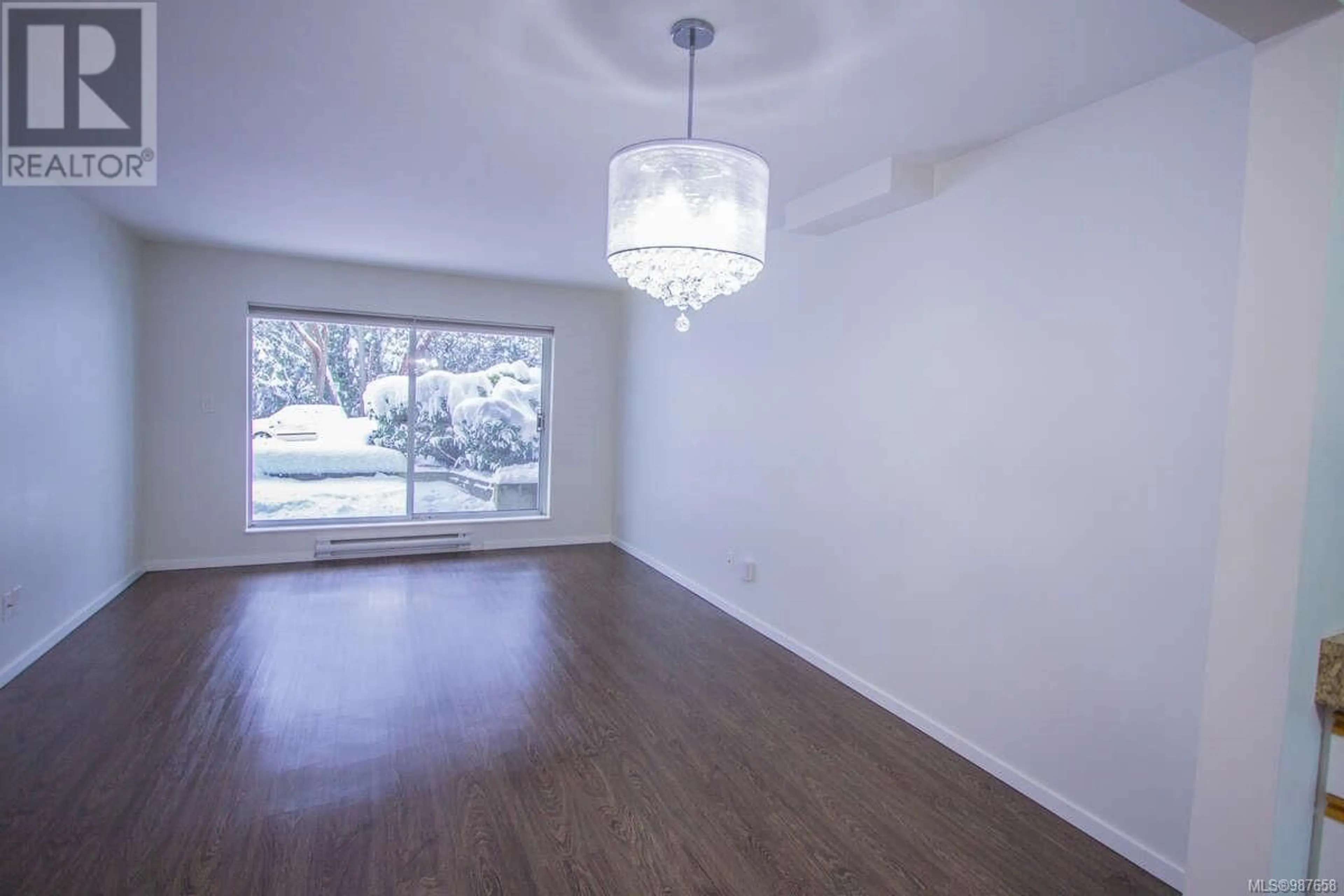 Dining room, wood/laminate floor for 128 6711 Dover Rd, Nanaimo British Columbia V9V1L9