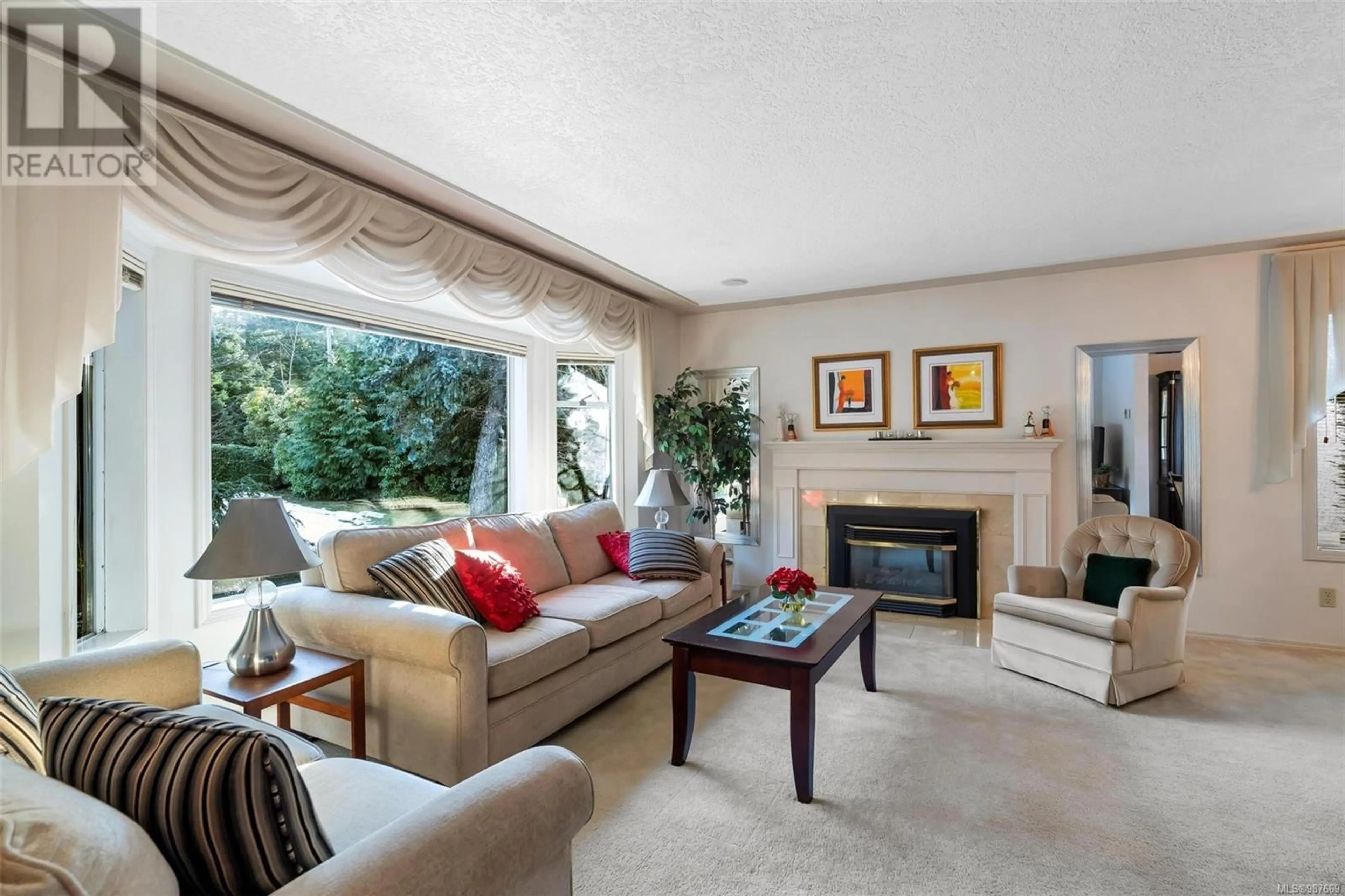 Living room with furniture, unknown for 4790 Cordova Bay Rd, Saanich British Columbia V8Y2J5