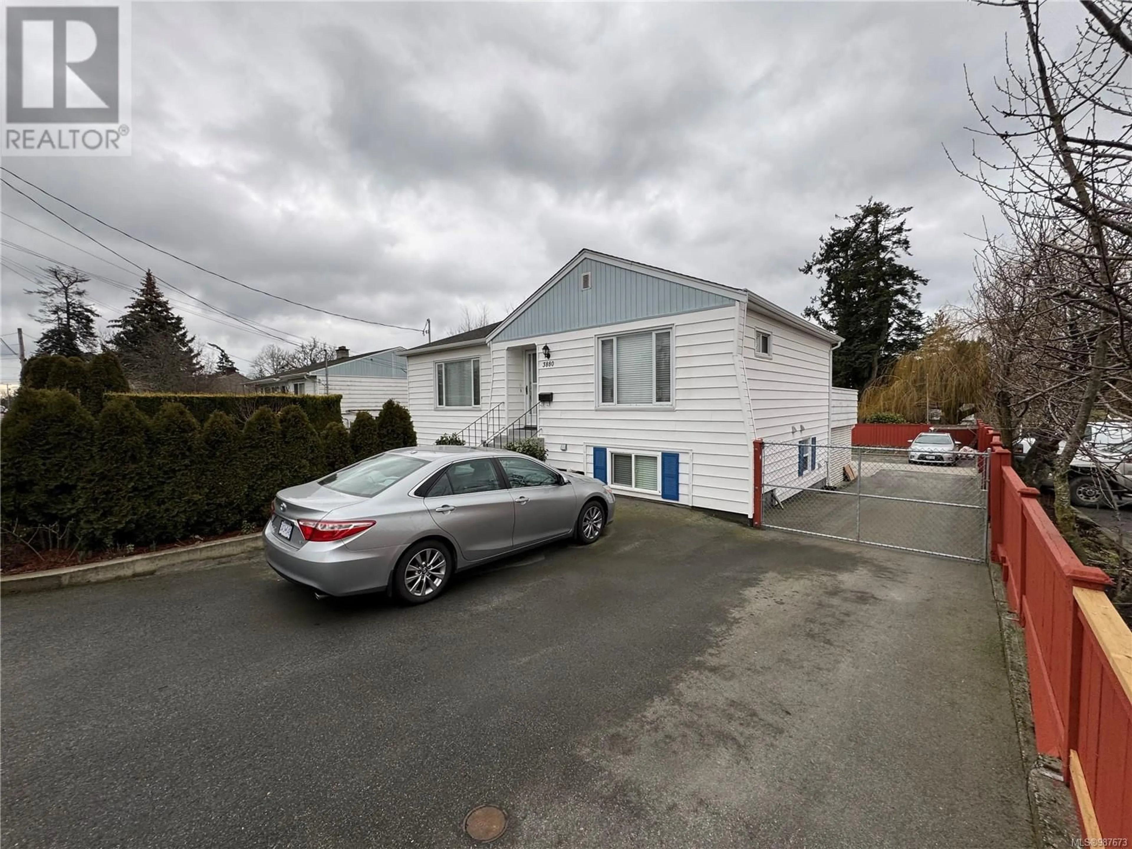 A pic from outside/outdoor area/front of a property/back of a property/a pic from drone, street for 3880 Carey Rd, Saanich British Columbia V8Z4C9