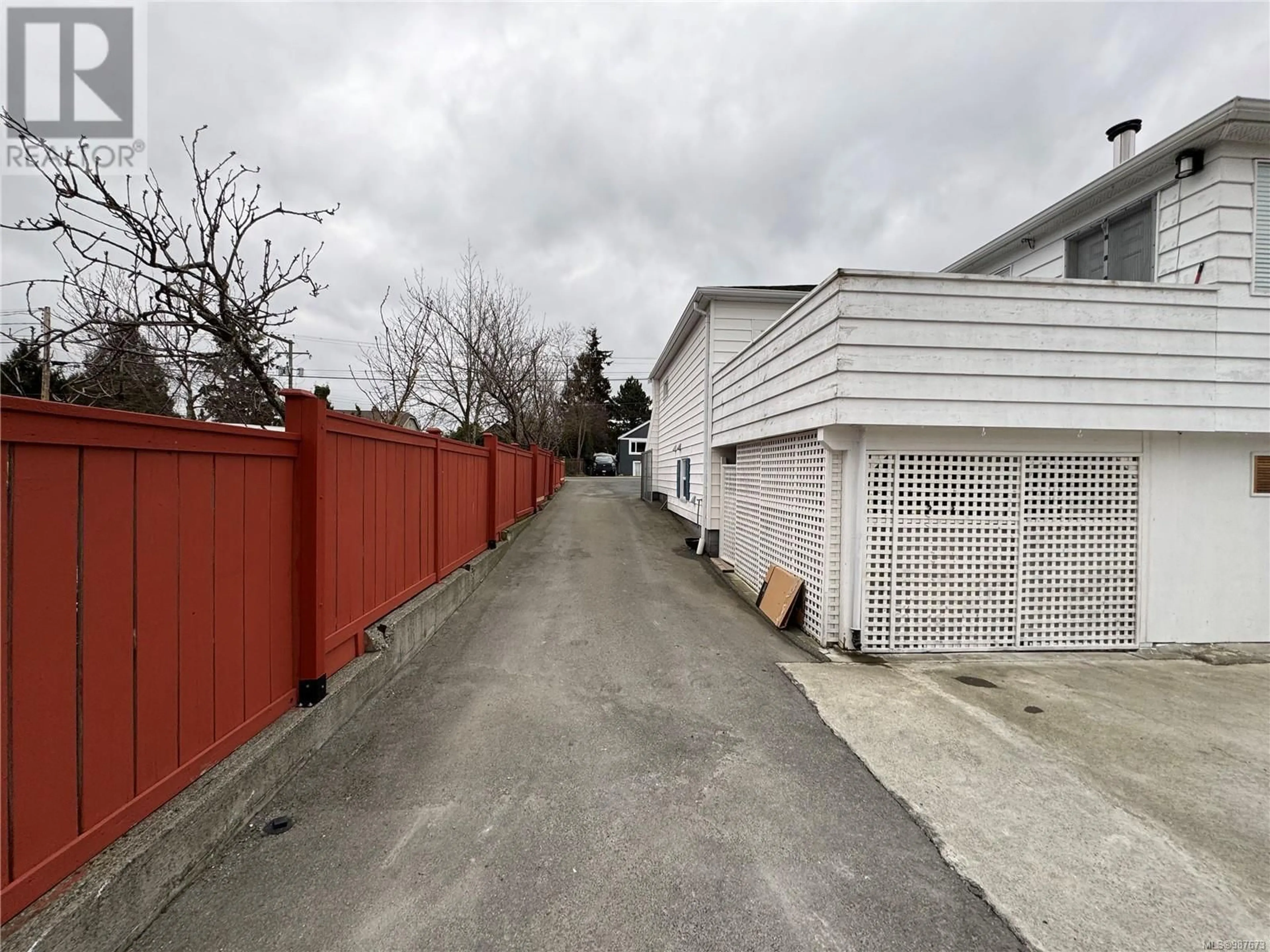 A pic from outside/outdoor area/front of a property/back of a property/a pic from drone, street for 3880 Carey Rd, Saanich British Columbia V8Z4C9