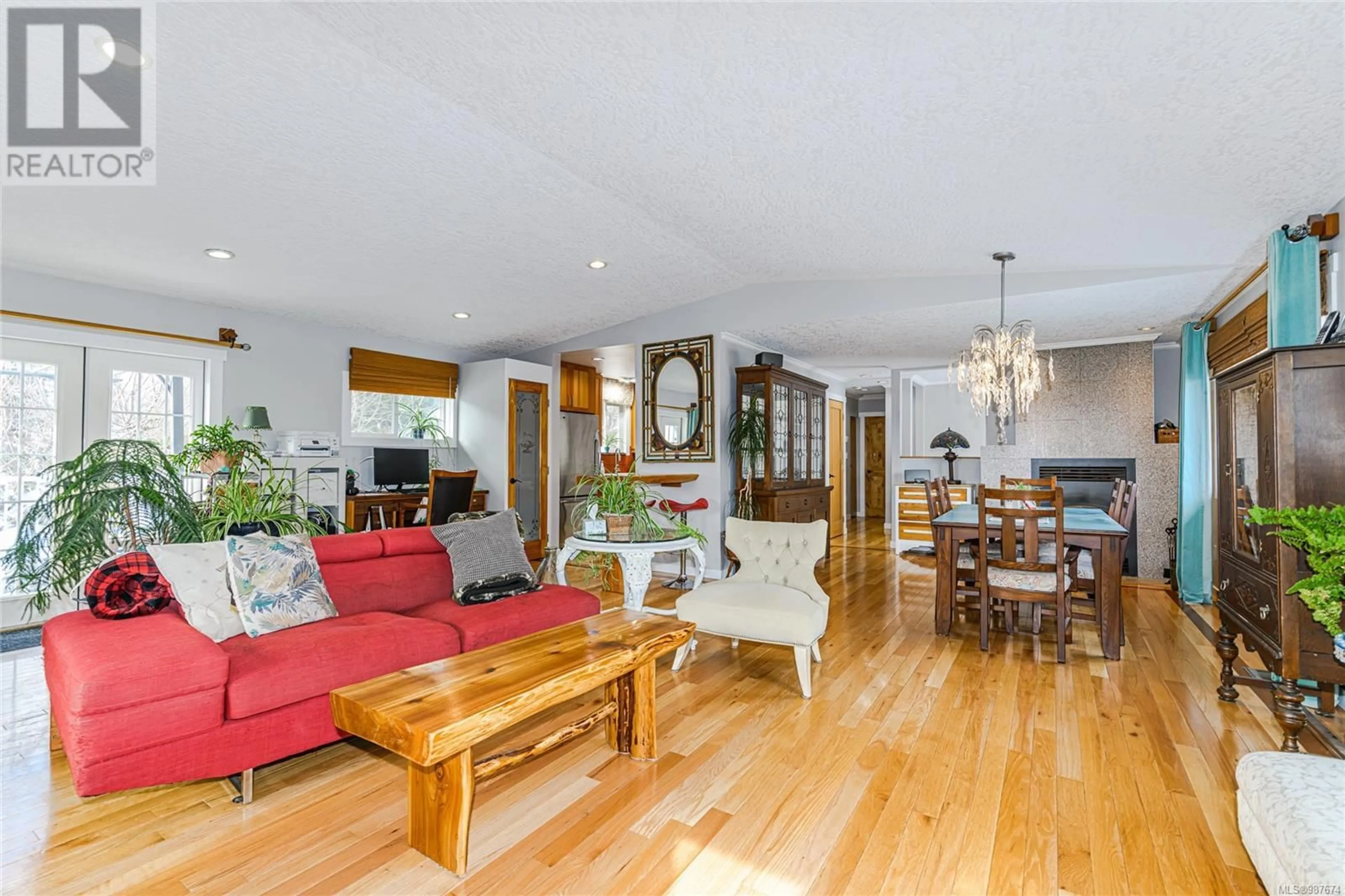 Living room with furniture, wood/laminate floor for 2212 FRENCH ROAD SOUTH, Sooke British Columbia V9Z1J5