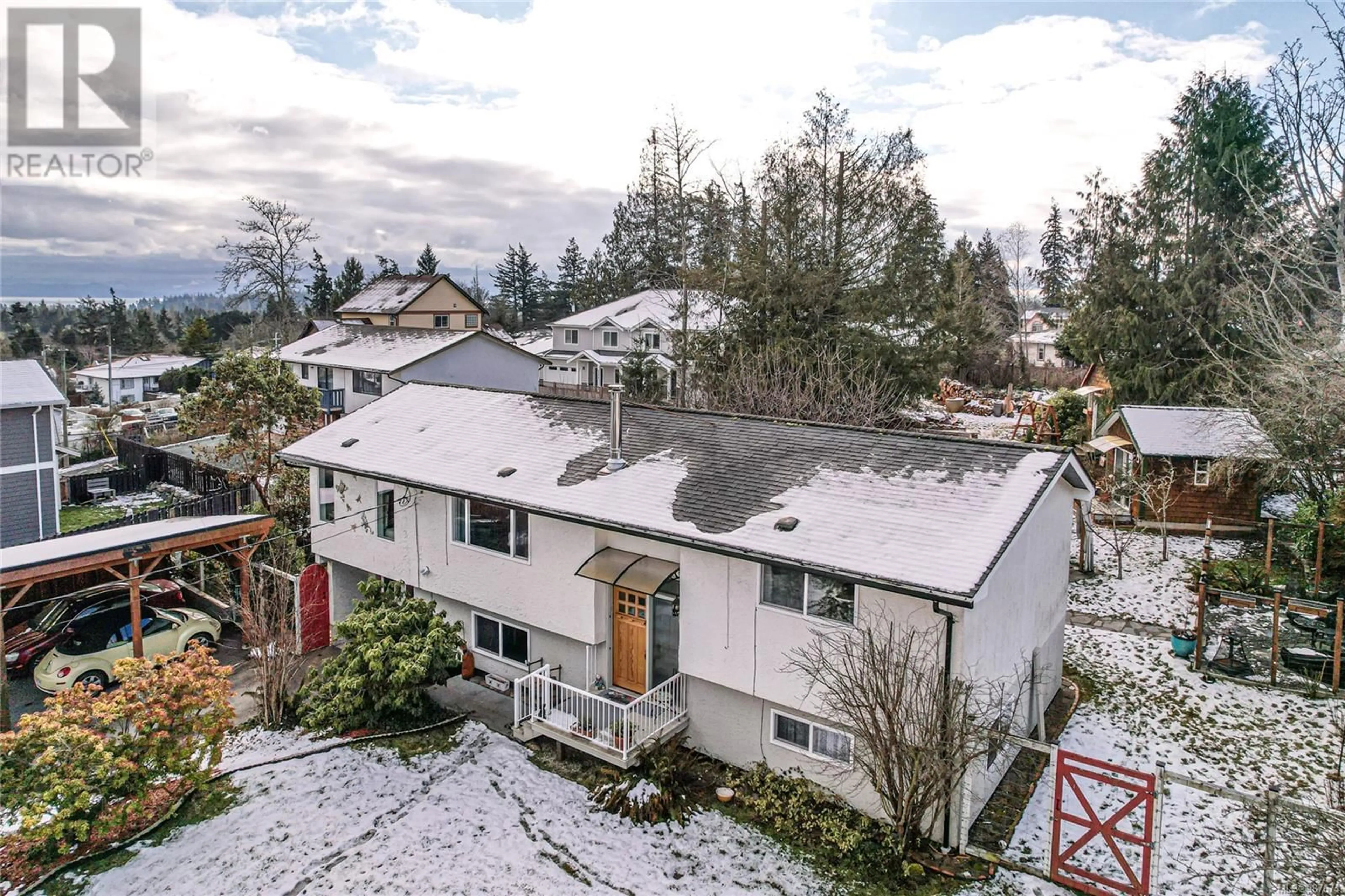 A pic from outside/outdoor area/front of a property/back of a property/a pic from drone, mountain view for 2212 French Rd S, Sooke British Columbia V9Z1J5