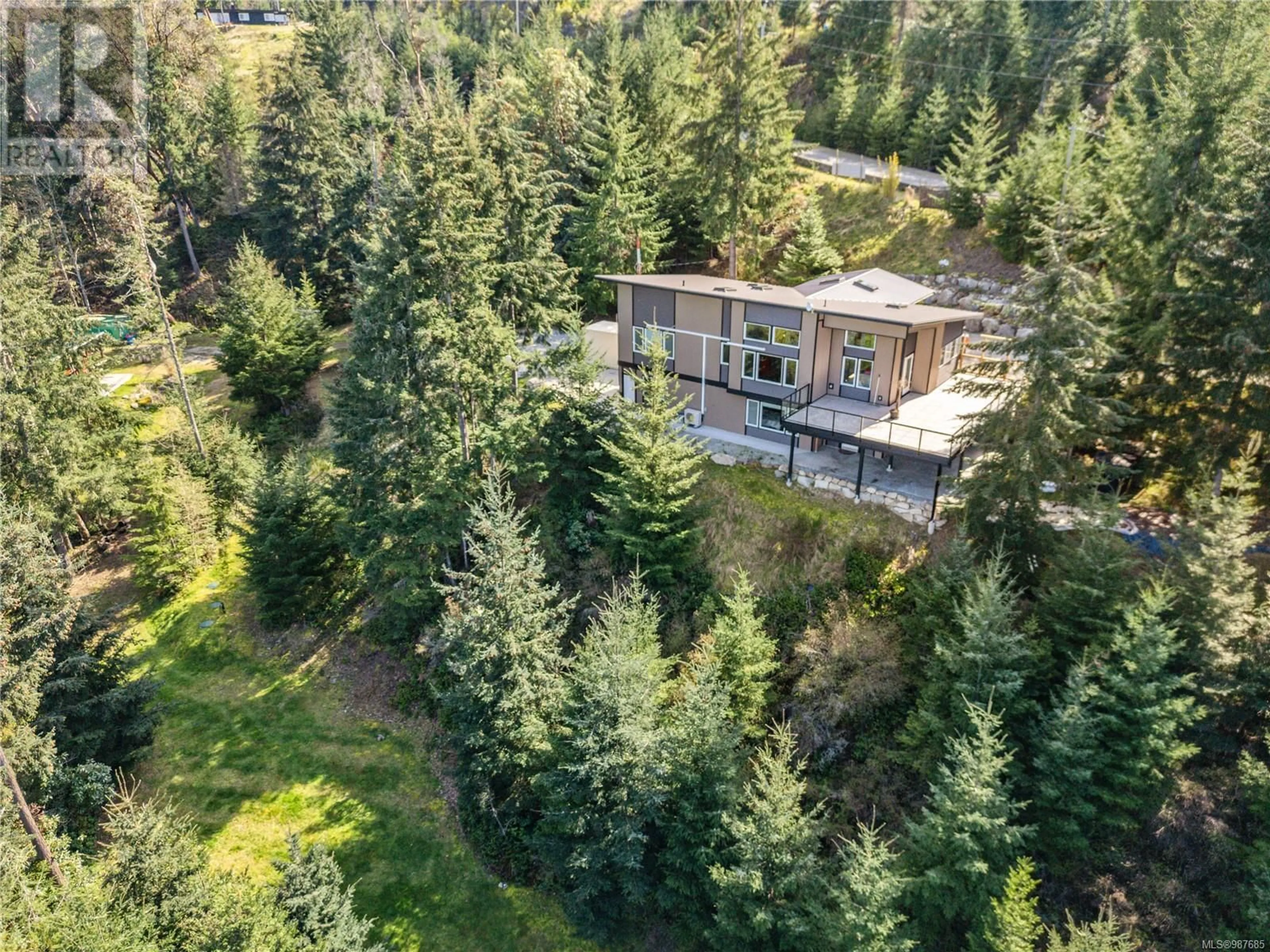 A pic from outside/outdoor area/front of a property/back of a property/a pic from drone, forest/trees view for 125 SPRING GOLD WAY, Salt Spring British Columbia V8K2Y1