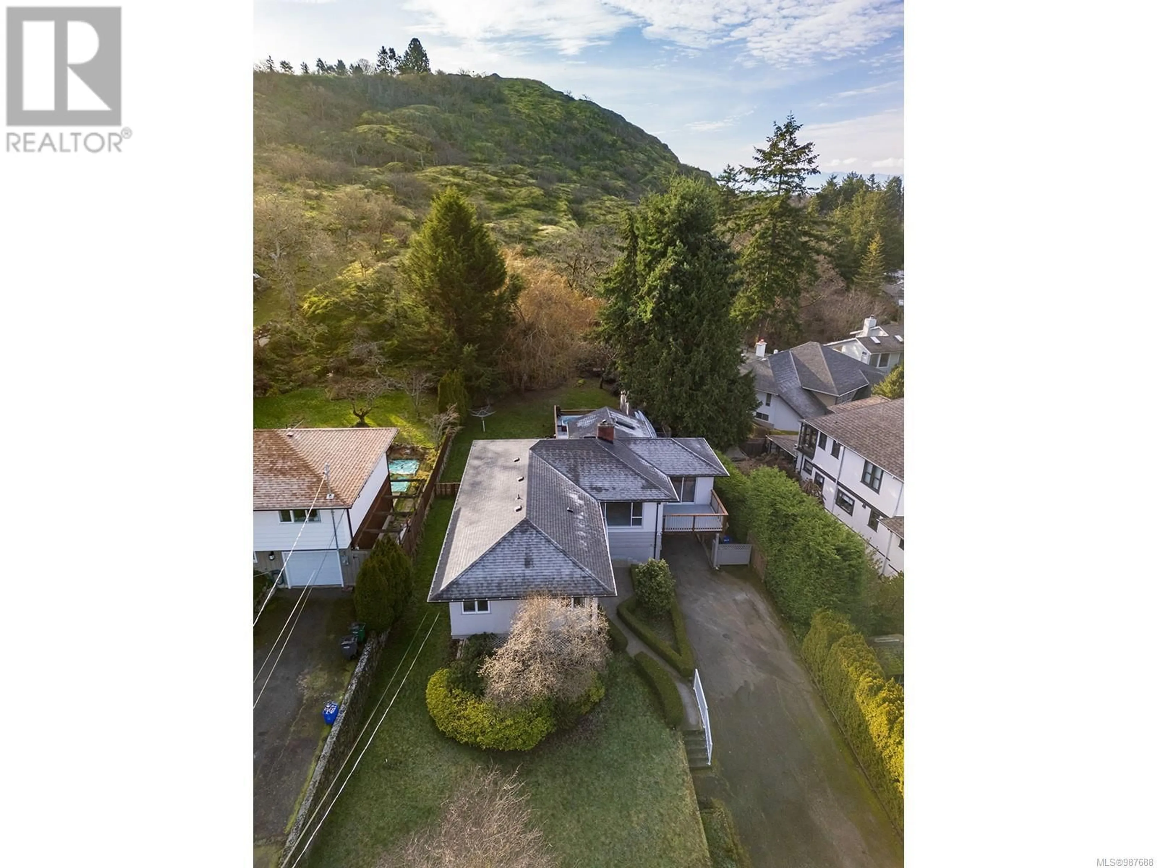 A pic from outside/outdoor area/front of a property/back of a property/a pic from drone, mountain view for 1751 Glastonbury Rd, Saanich British Columbia V8P2H4