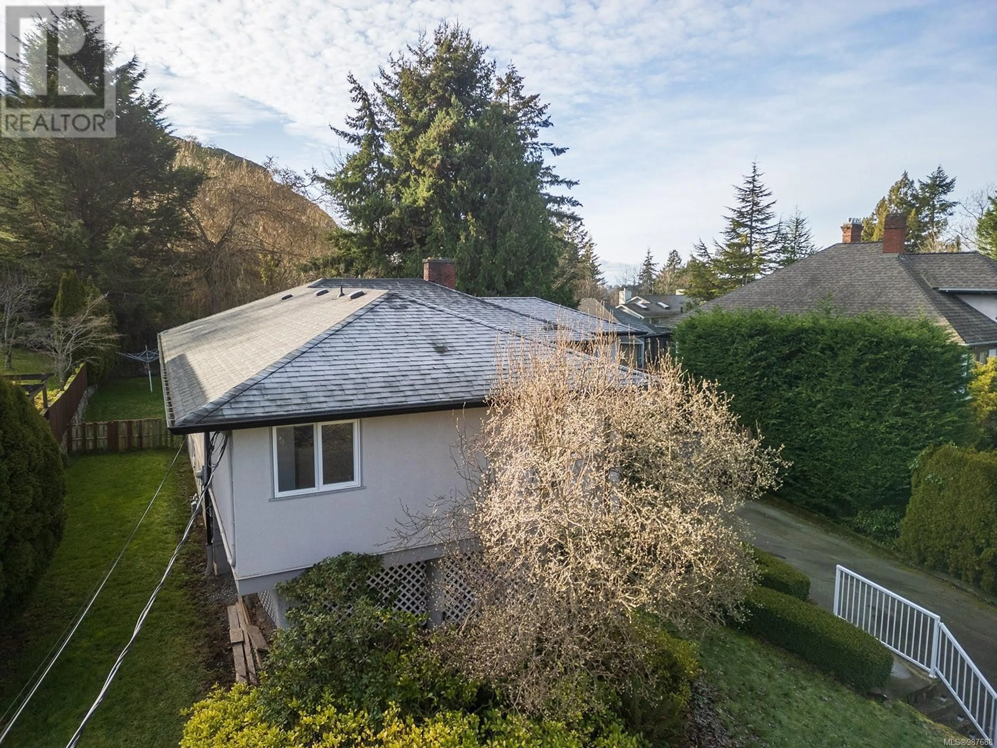 A pic from outside/outdoor area/front of a property/back of a property/a pic from drone, street for 1751 Glastonbury Rd, Saanich British Columbia V8P2H4