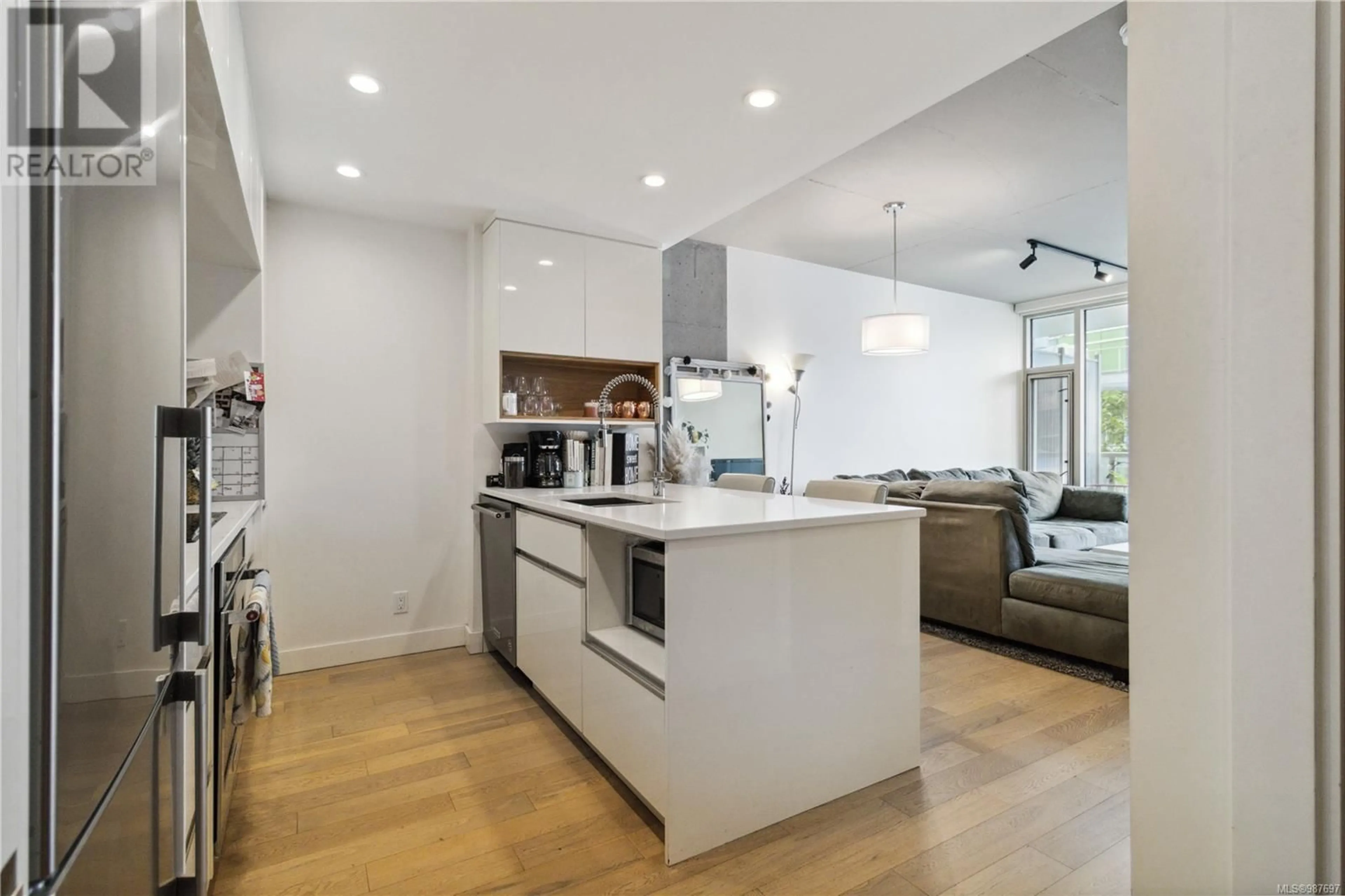 Open concept kitchen, unknown for 209 989 Johnson St, Victoria British Columbia V8V0E3