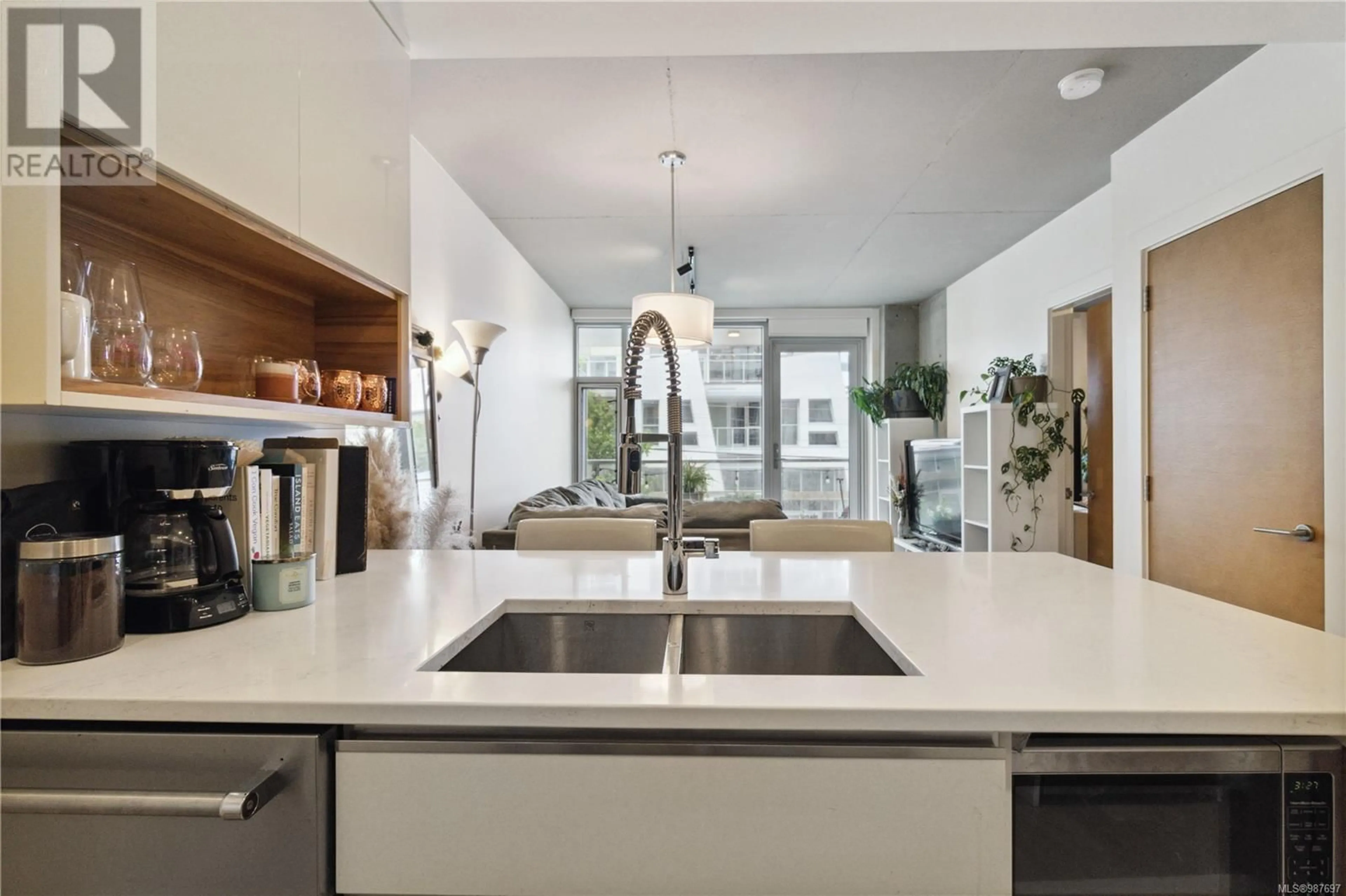 Open concept kitchen, ceramic/tile floor for 209 989 Johnson St, Victoria British Columbia V8V0E3