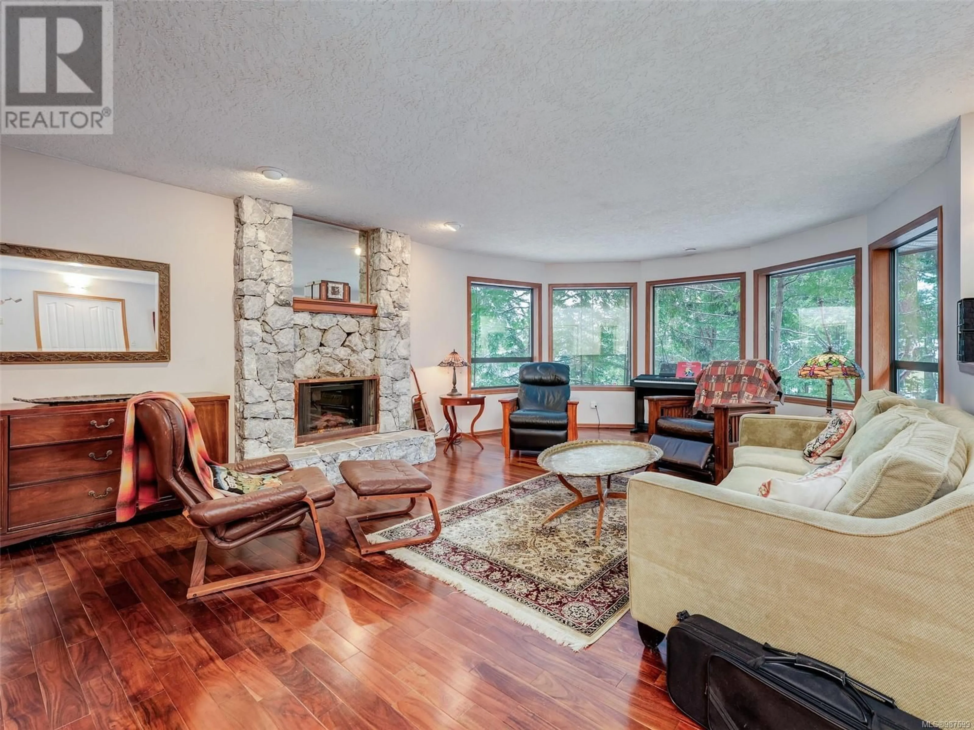 Living room with furniture, unknown for 1429 HONEYSUCKLE PLACE, North Saanich British Columbia V8L5J8