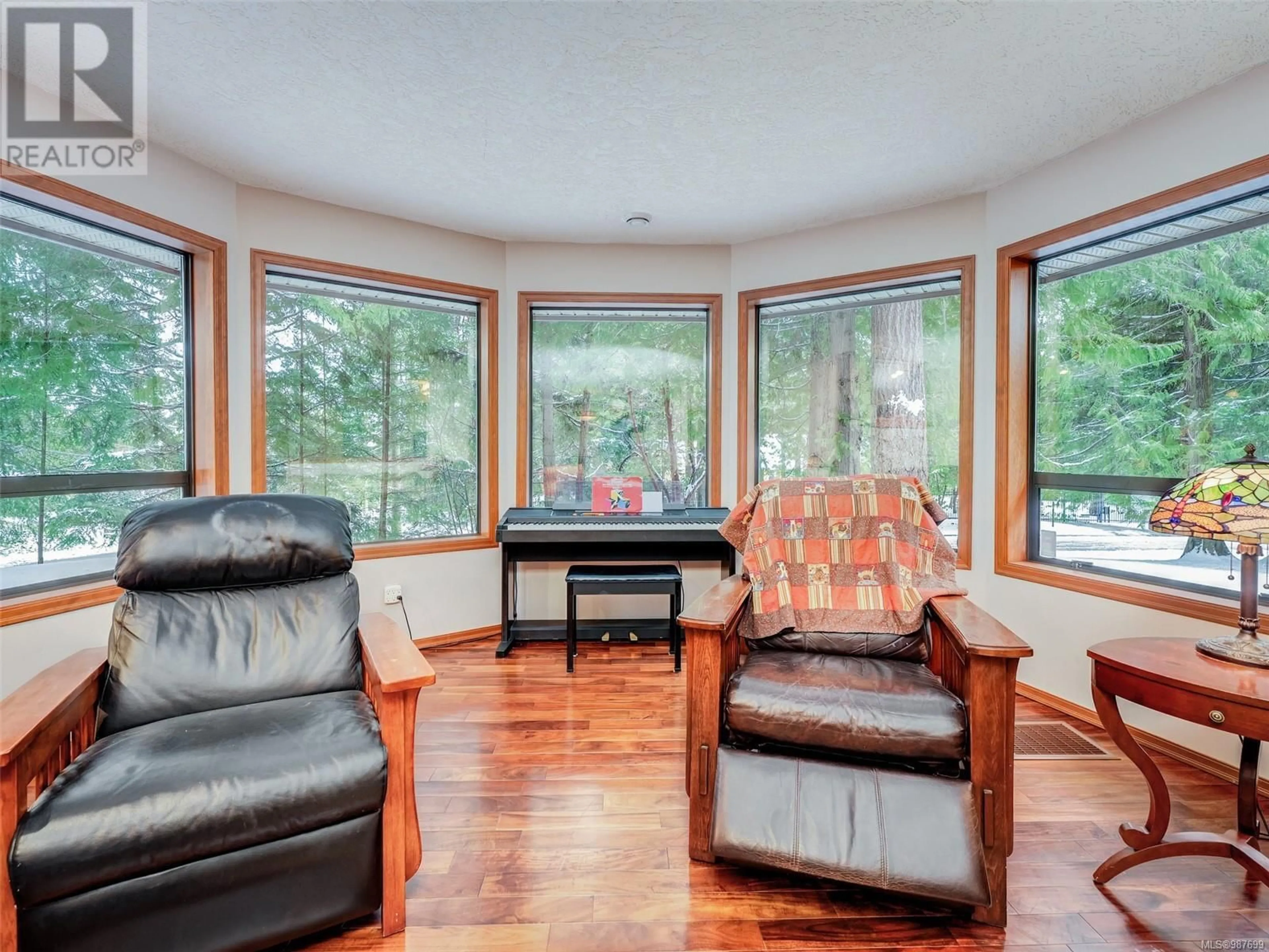 Living room with furniture, unknown for 1429 Honeysuckle Pl, North Saanich British Columbia V8L6S8