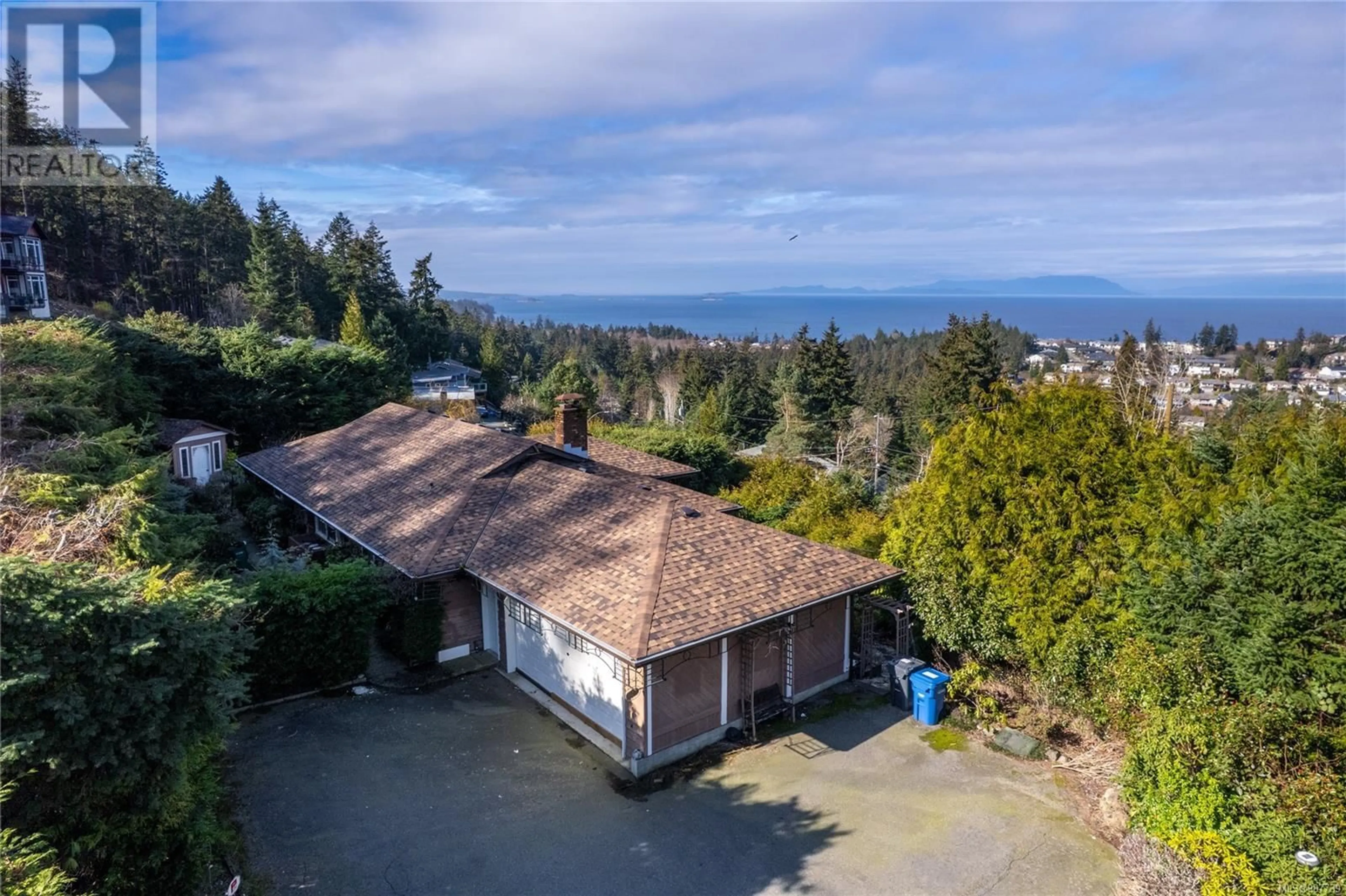 A pic from outside/outdoor area/front of a property/back of a property/a pic from drone, water/lake/river/ocean view for 4733 Laguna Way, Nanaimo British Columbia V9T5C2