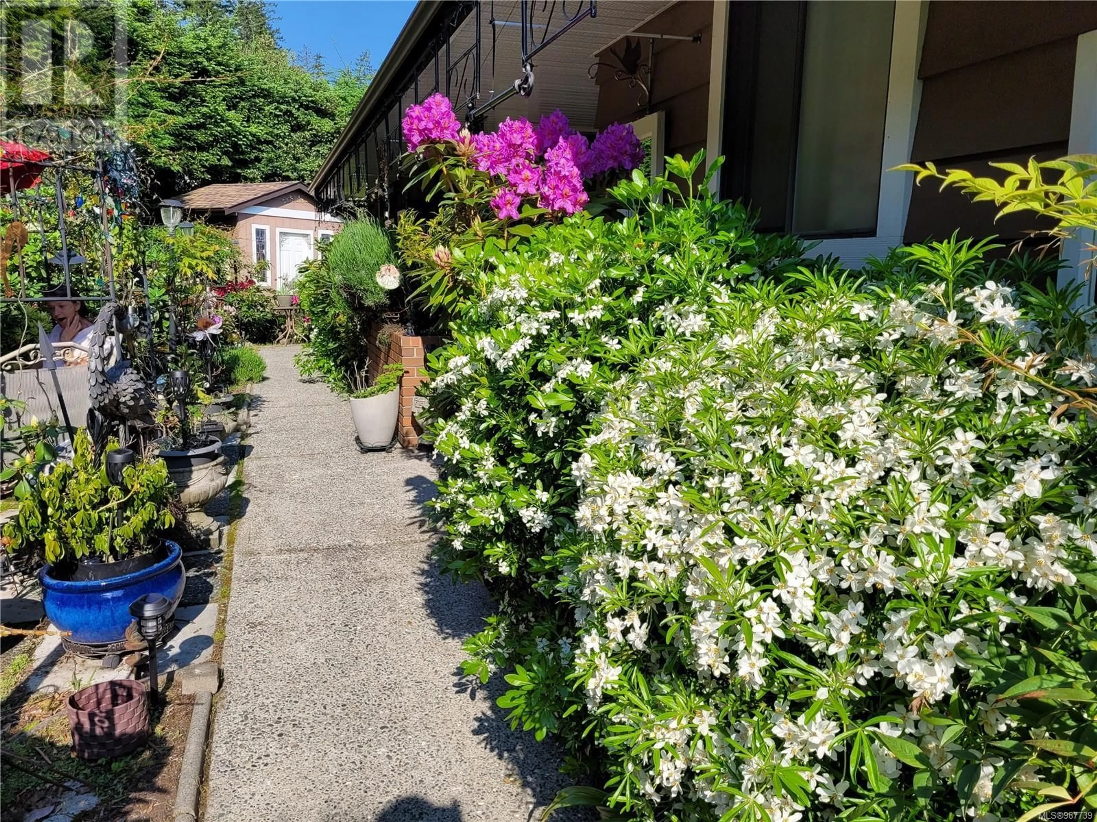 A pic from outside/outdoor area/front of a property/back of a property/a pic from drone, street for 4733 Laguna Way, Nanaimo British Columbia V9T5C2