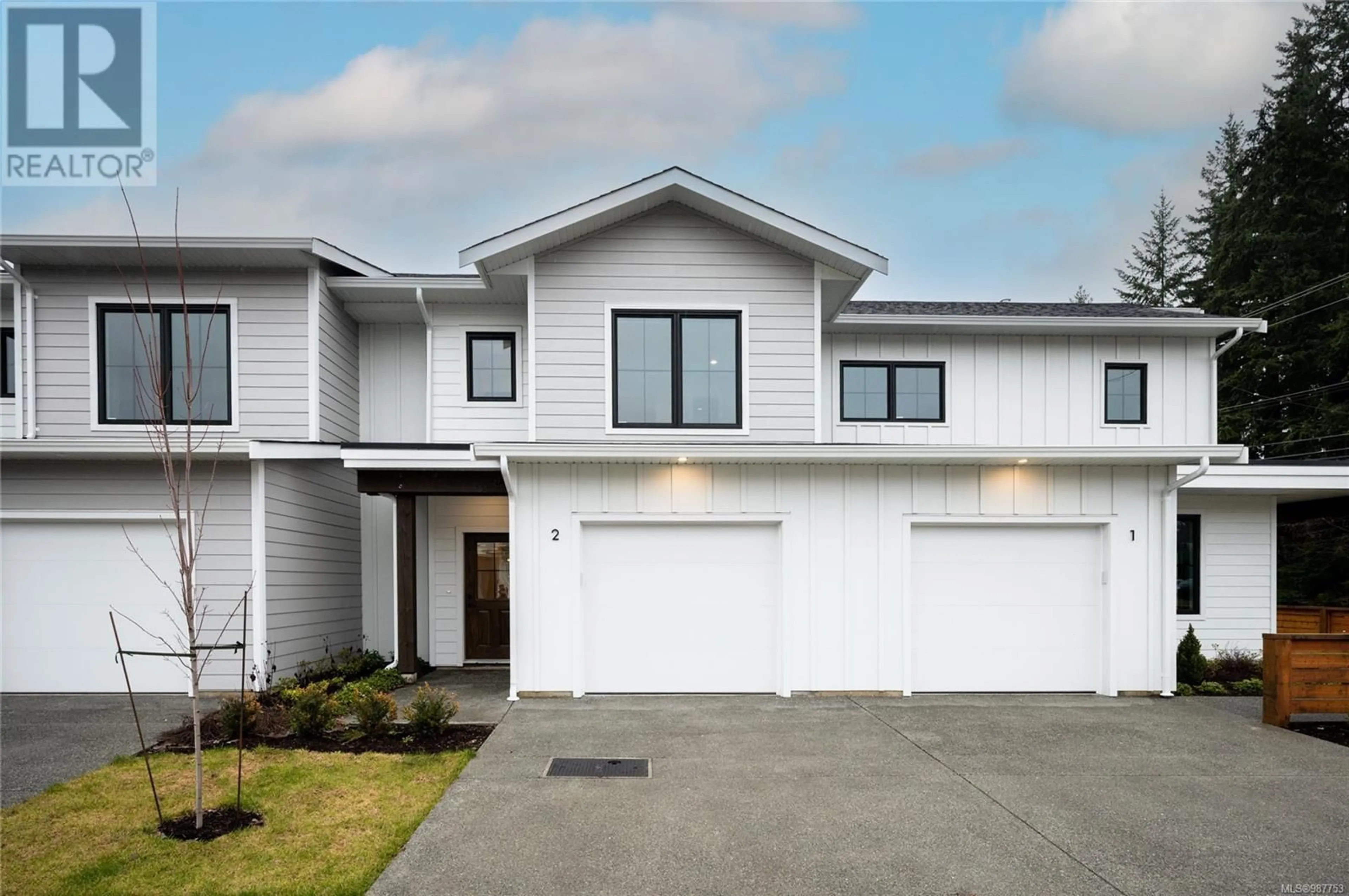 Home with vinyl exterior material, street for 2 1090 Evergreen Rd, Campbell River British Columbia V9W3R9