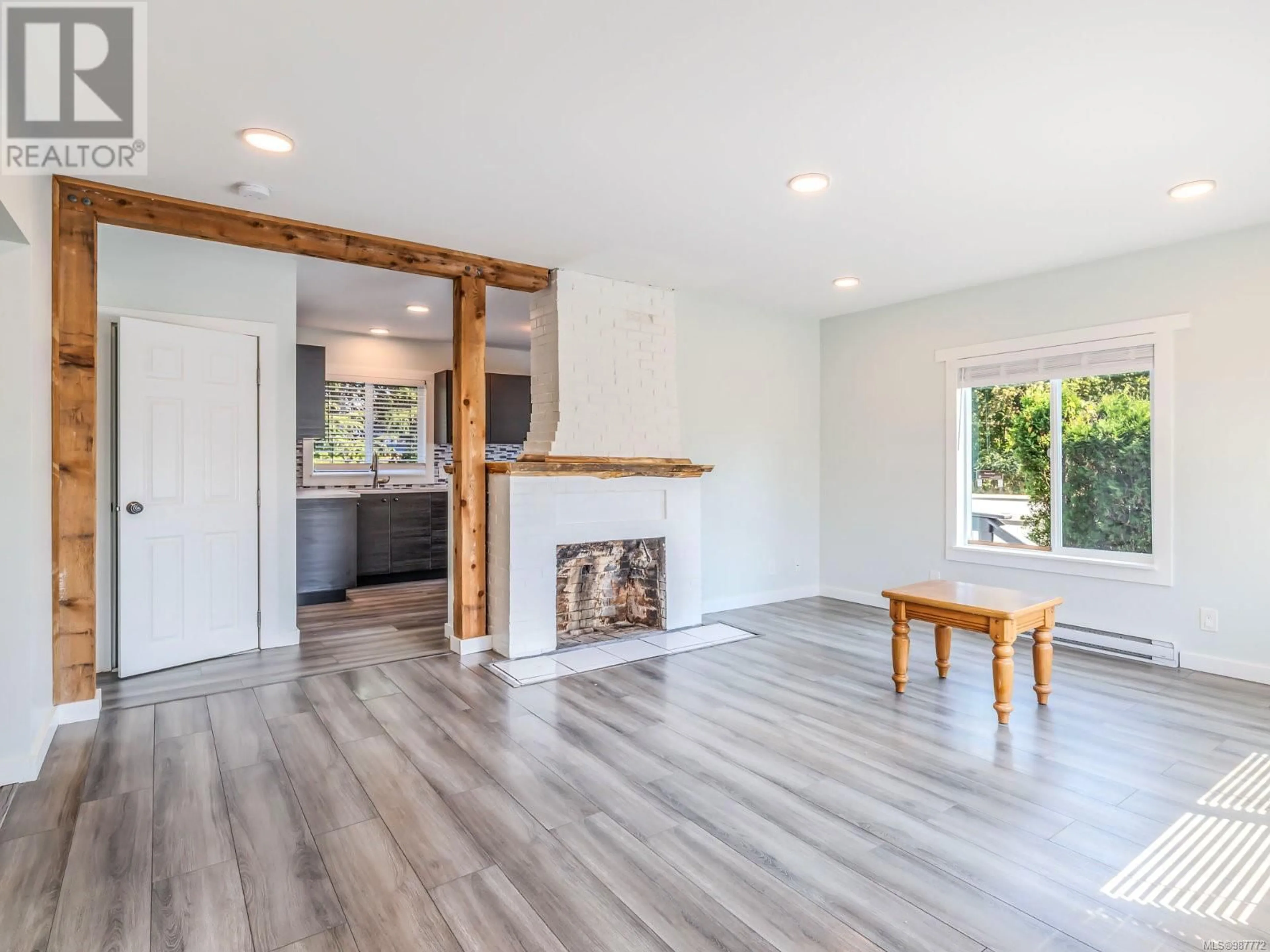 Living room with furniture, wood/laminate floor for 5013 Melrose St, Port Alberni British Columbia V9Y1K1