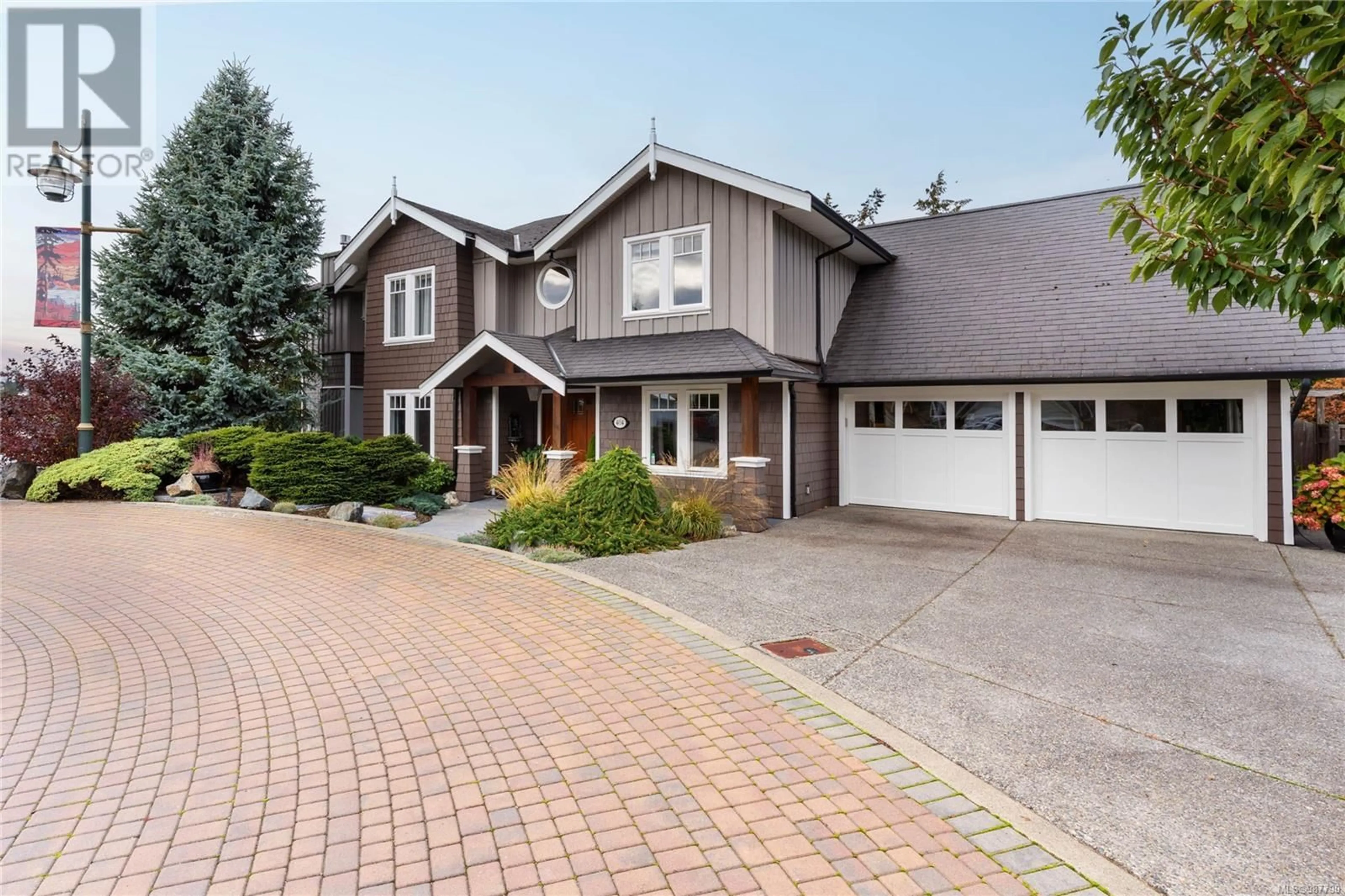 Home with brick exterior material, street for 404 Margaret Lane, View Royal British Columbia V9B6M2