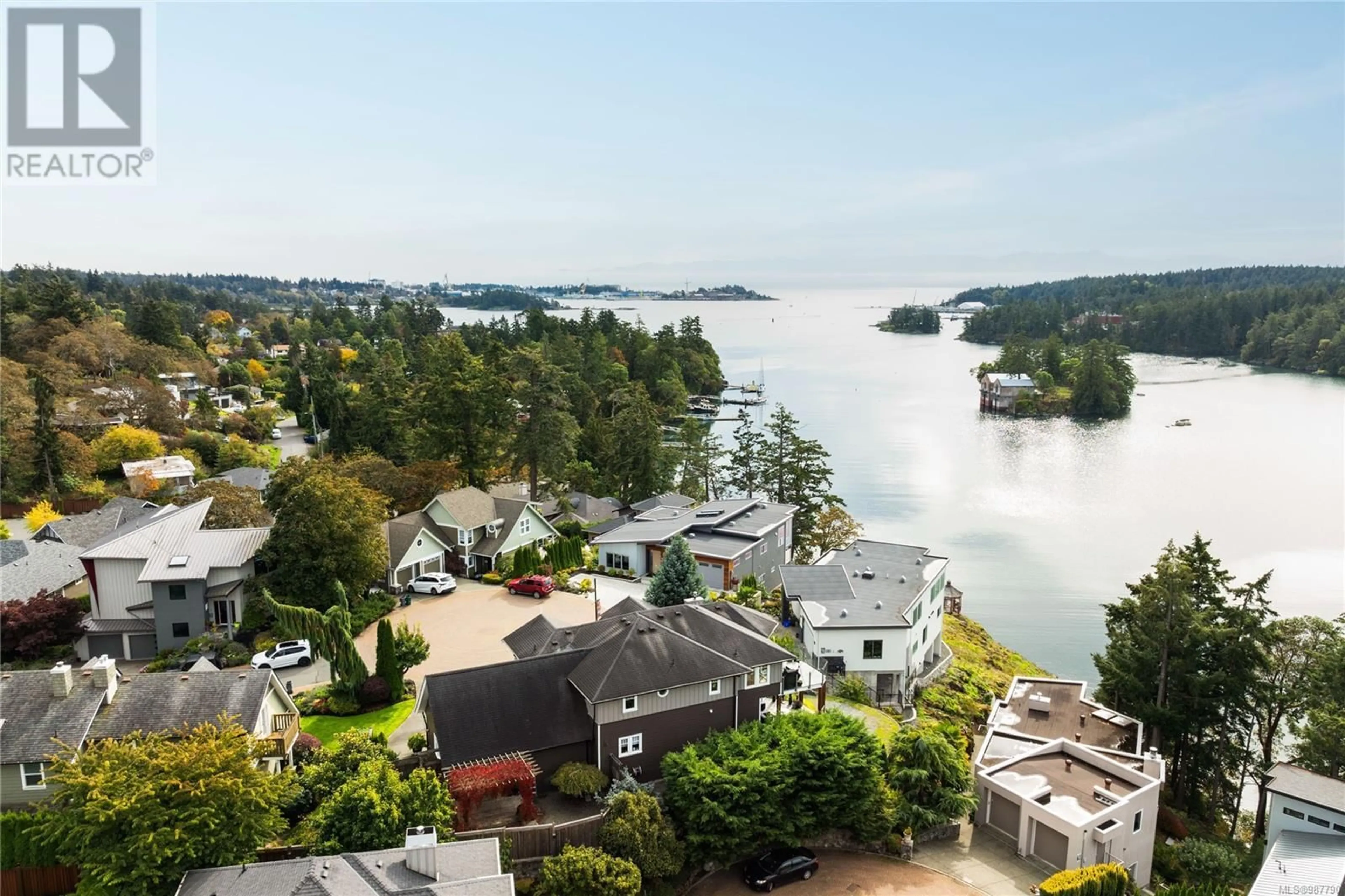 A pic from outside/outdoor area/front of a property/back of a property/a pic from drone, water/lake/river/ocean view for 404 Margaret Lane, View Royal British Columbia V9B6M2