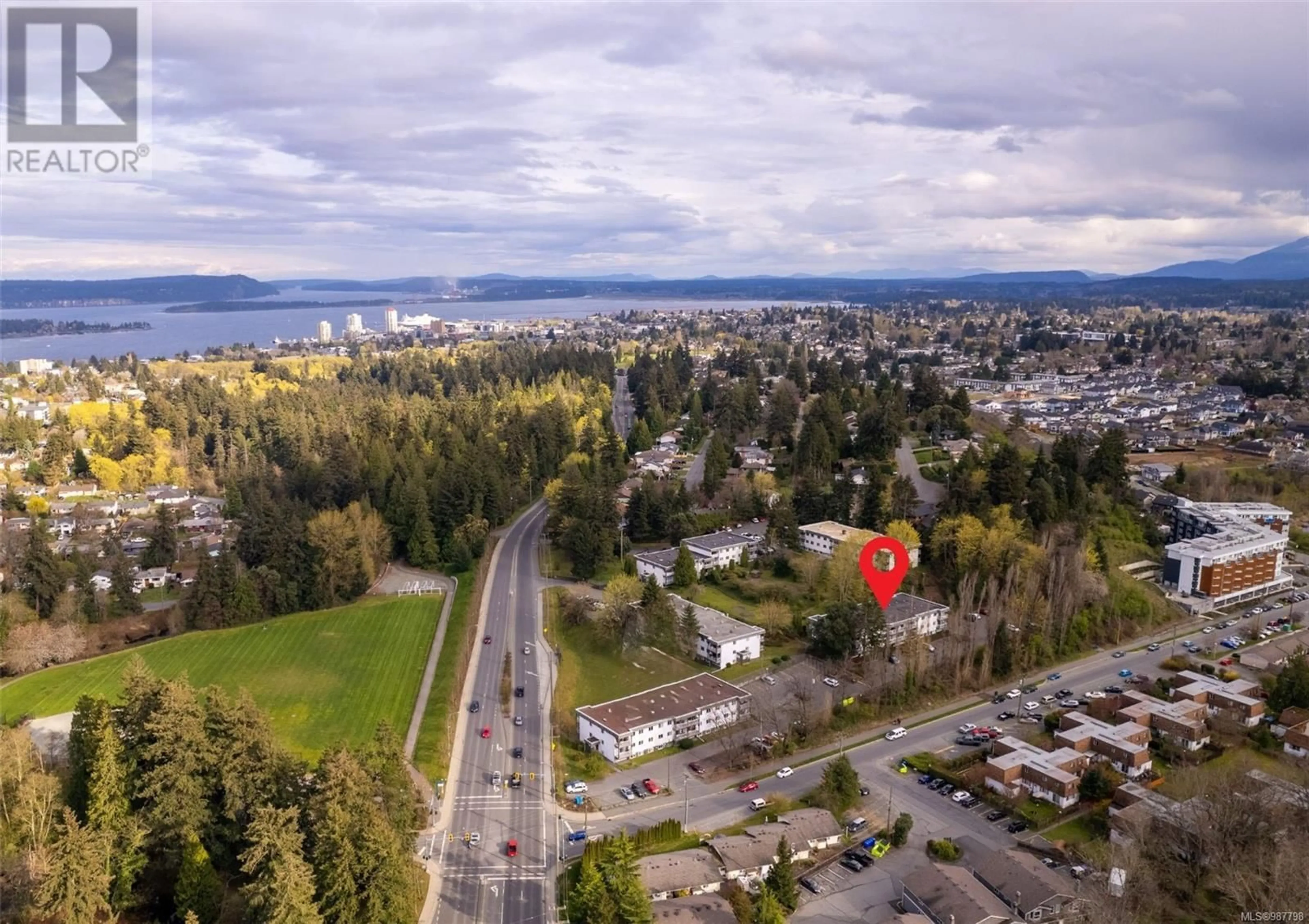 A pic from outside/outdoor area/front of a property/back of a property/a pic from drone, mountain view for 5106 999 Bowen Rd, Nanaimo British Columbia V9R2A4