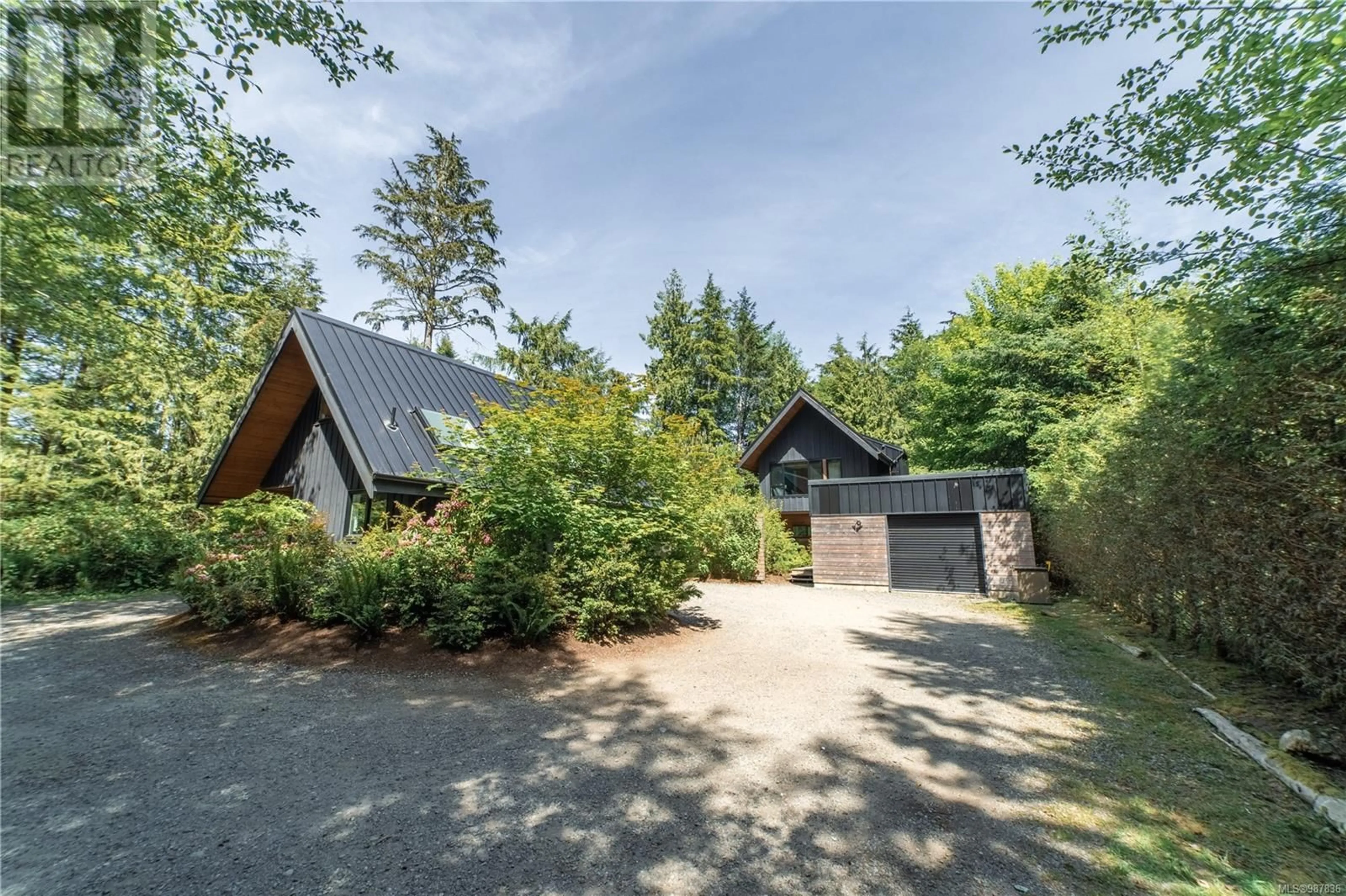 A pic from outside/outdoor area/front of a property/back of a property/a pic from drone, unknown for 1156 Pacific Rim Hwy, Tofino British Columbia V0R2Z0