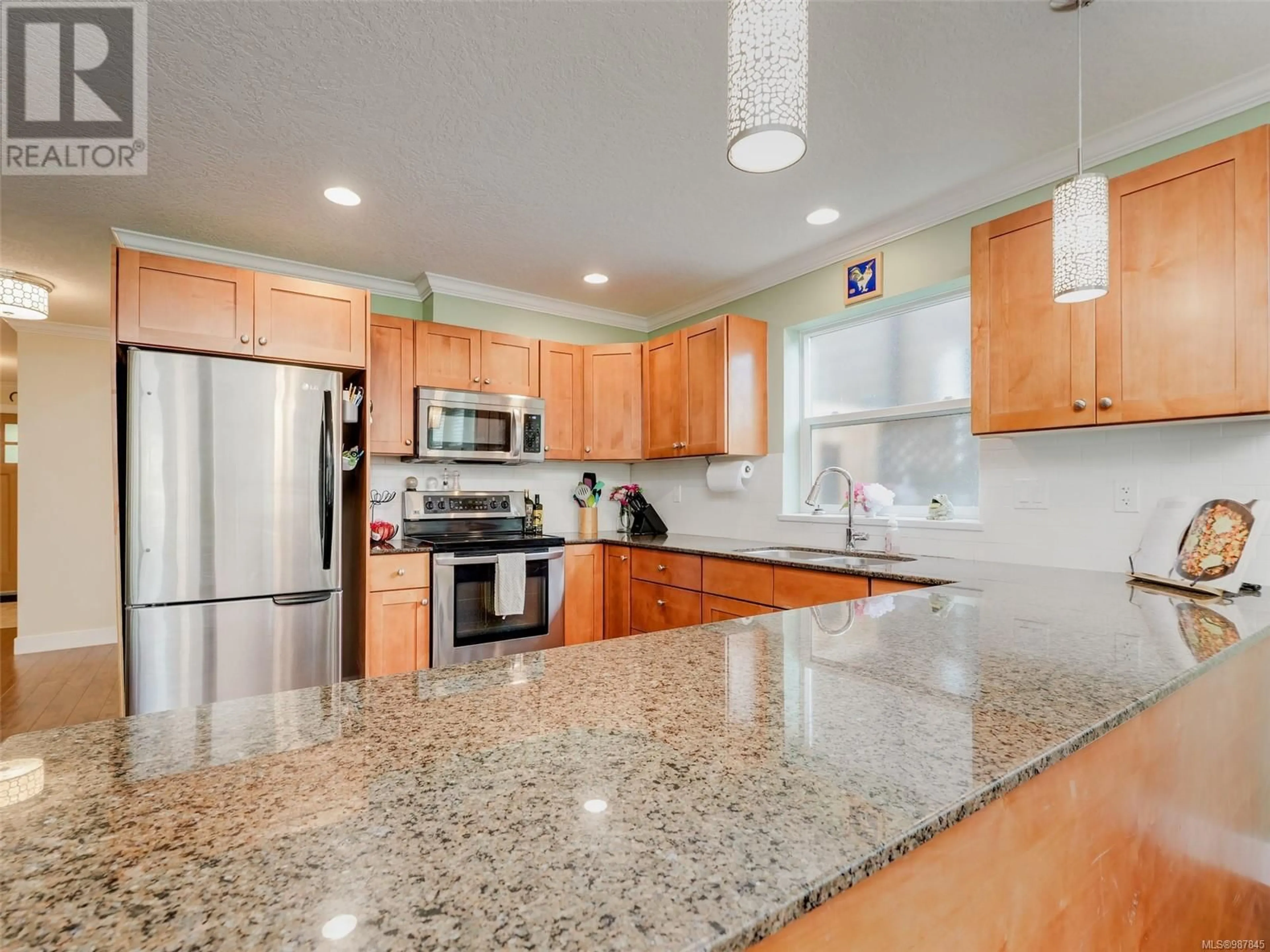 Open concept kitchen, ceramic/tile floor for 3314 Hazelwood Rd, Langford British Columbia V9C0H3