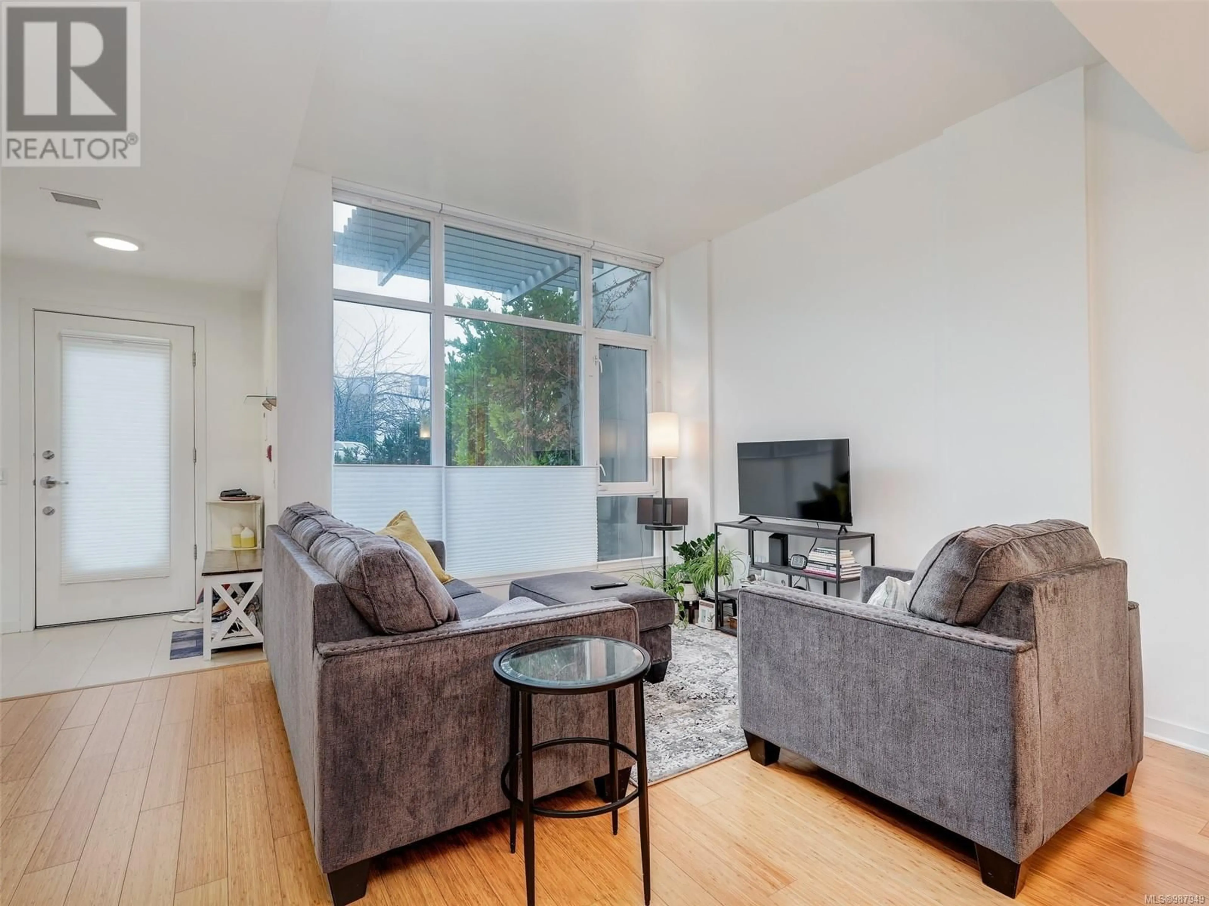 Living room with furniture, unknown for 102 - 379 TYEE ROAD, Victoria British Columbia V9A0B4