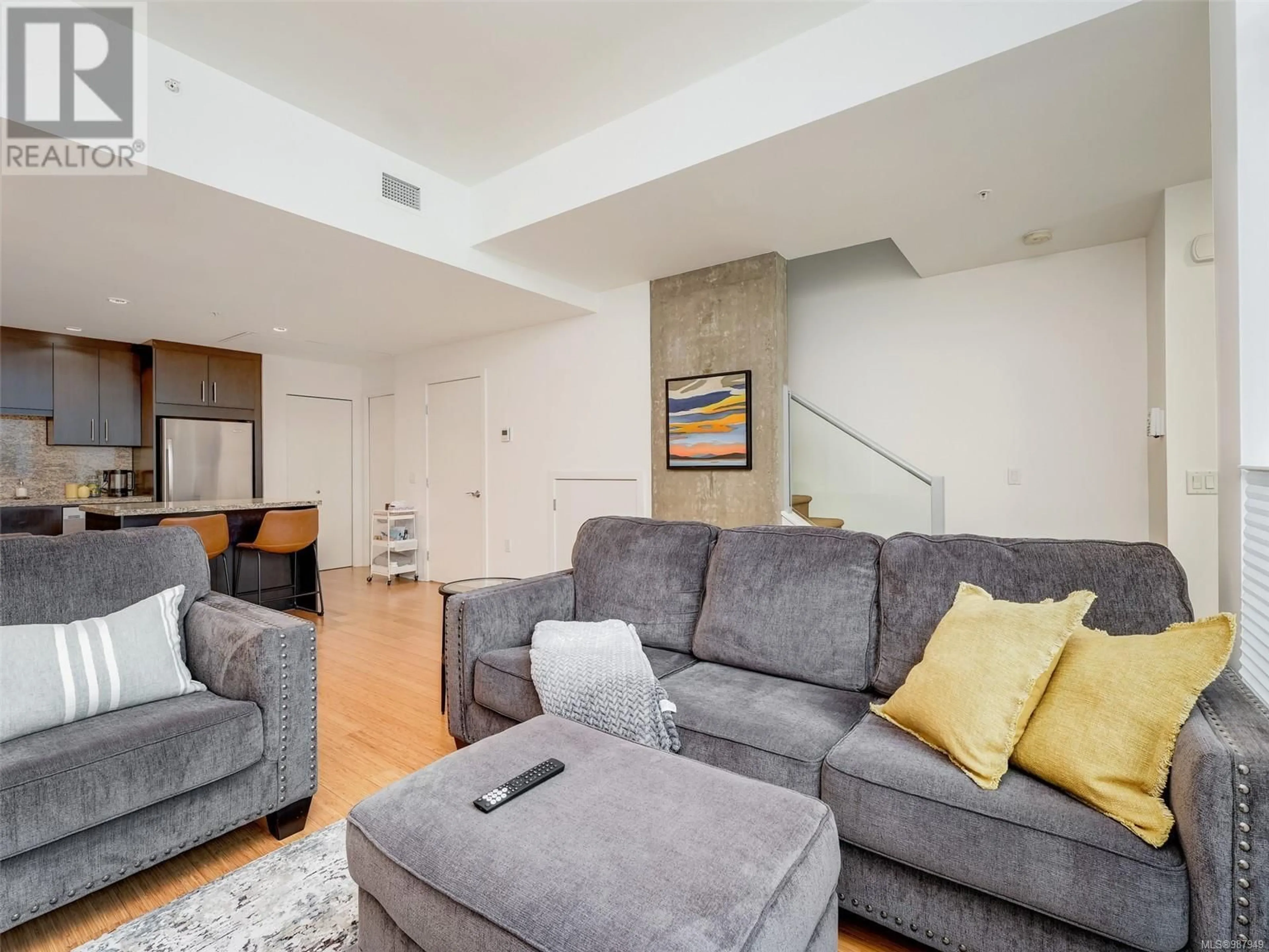 Living room with furniture, unknown for 102 - 379 TYEE ROAD, Victoria British Columbia V9A0B4