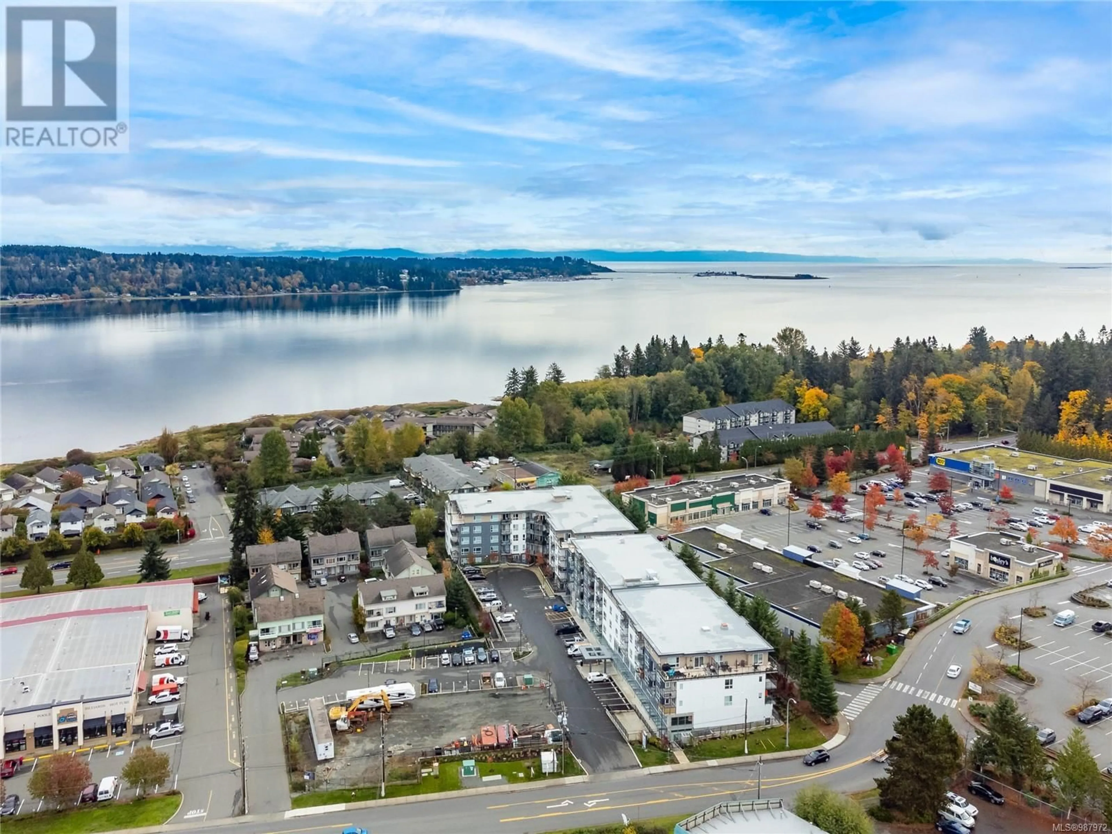 A pic from outside/outdoor area/front of a property/back of a property/a pic from drone, water/lake/river/ocean view for 207 - 3070 KILPATRICK AVENUE, Courtenay British Columbia V9N0G7