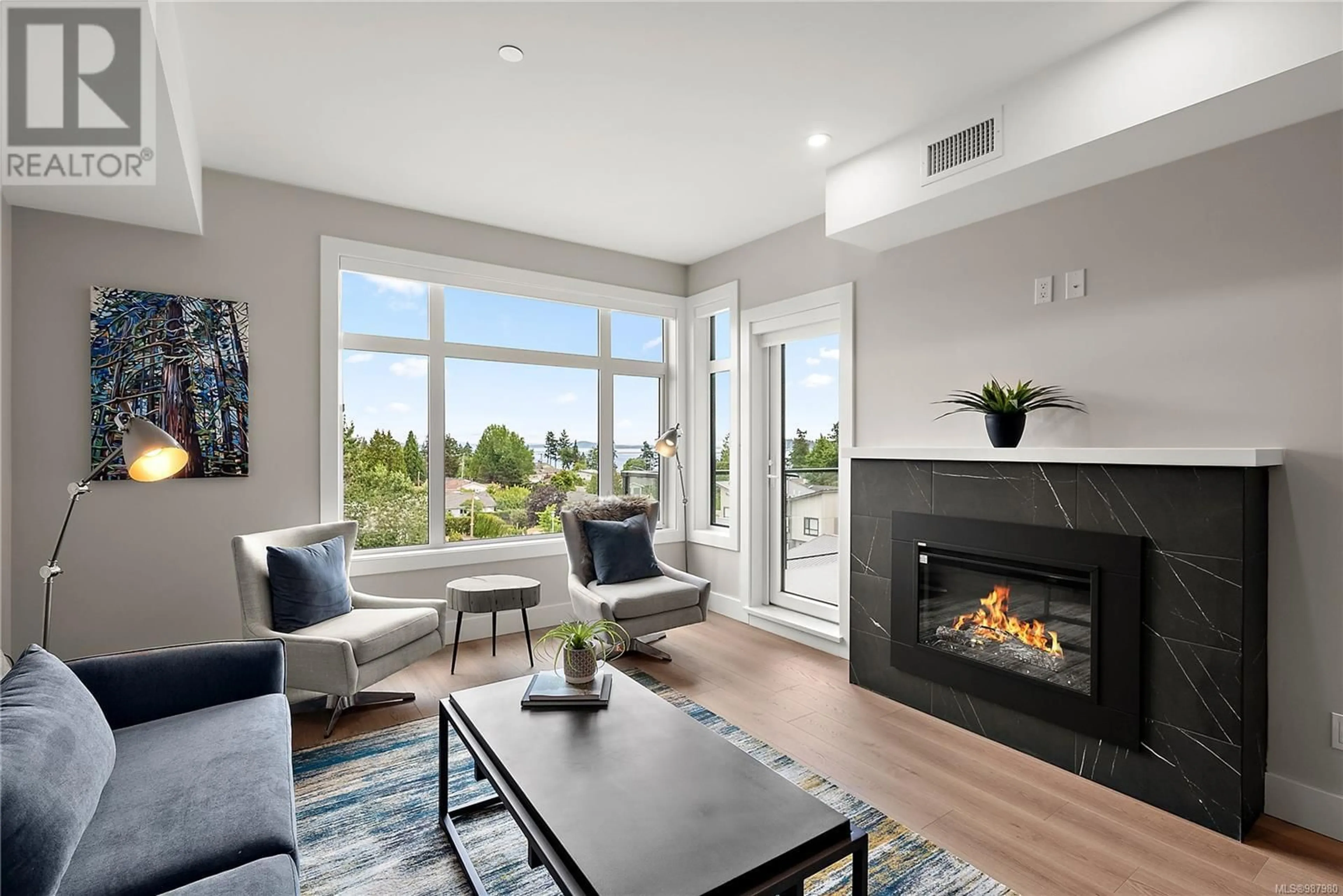 Living room with furniture, unknown for 302 2520 Hackett Cres, Central Saanich British Columbia V8M0B9