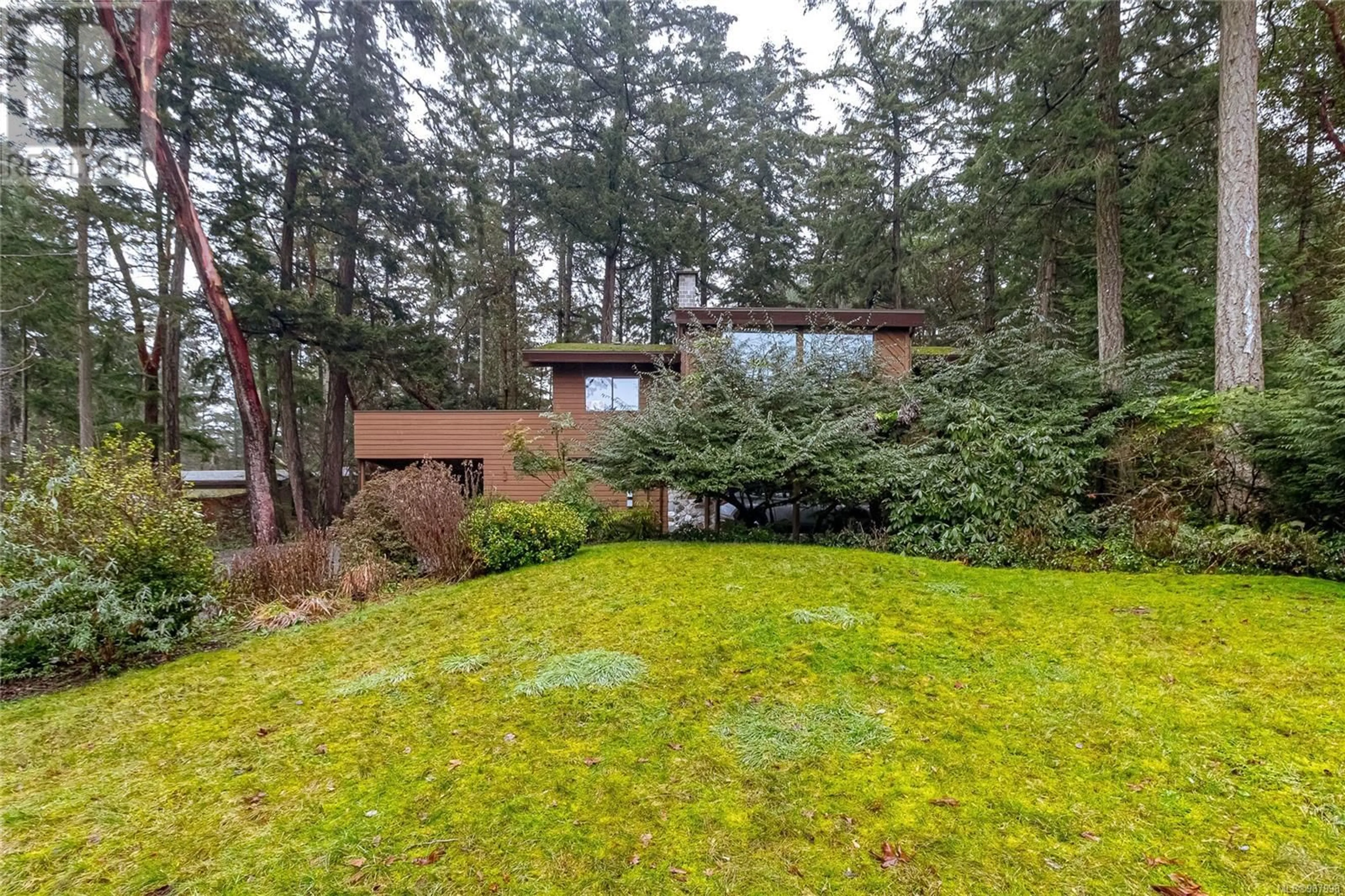 A pic from outside/outdoor area/front of a property/back of a property/a pic from drone, forest/trees view for 11125 Trillium Pl, North Saanich British Columbia V8L5M4