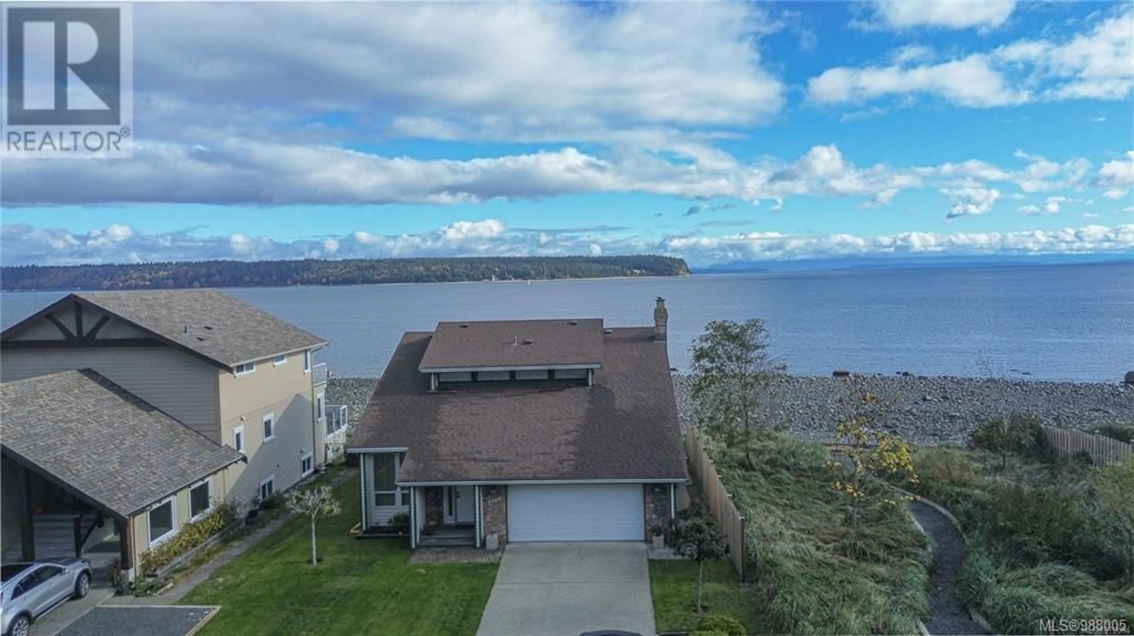 A pic from outside/outdoor area/front of a property/back of a property/a pic from drone, water/lake/river/ocean view for 1081 Island Hwy S, Campbell River British Columbia V9W1B4