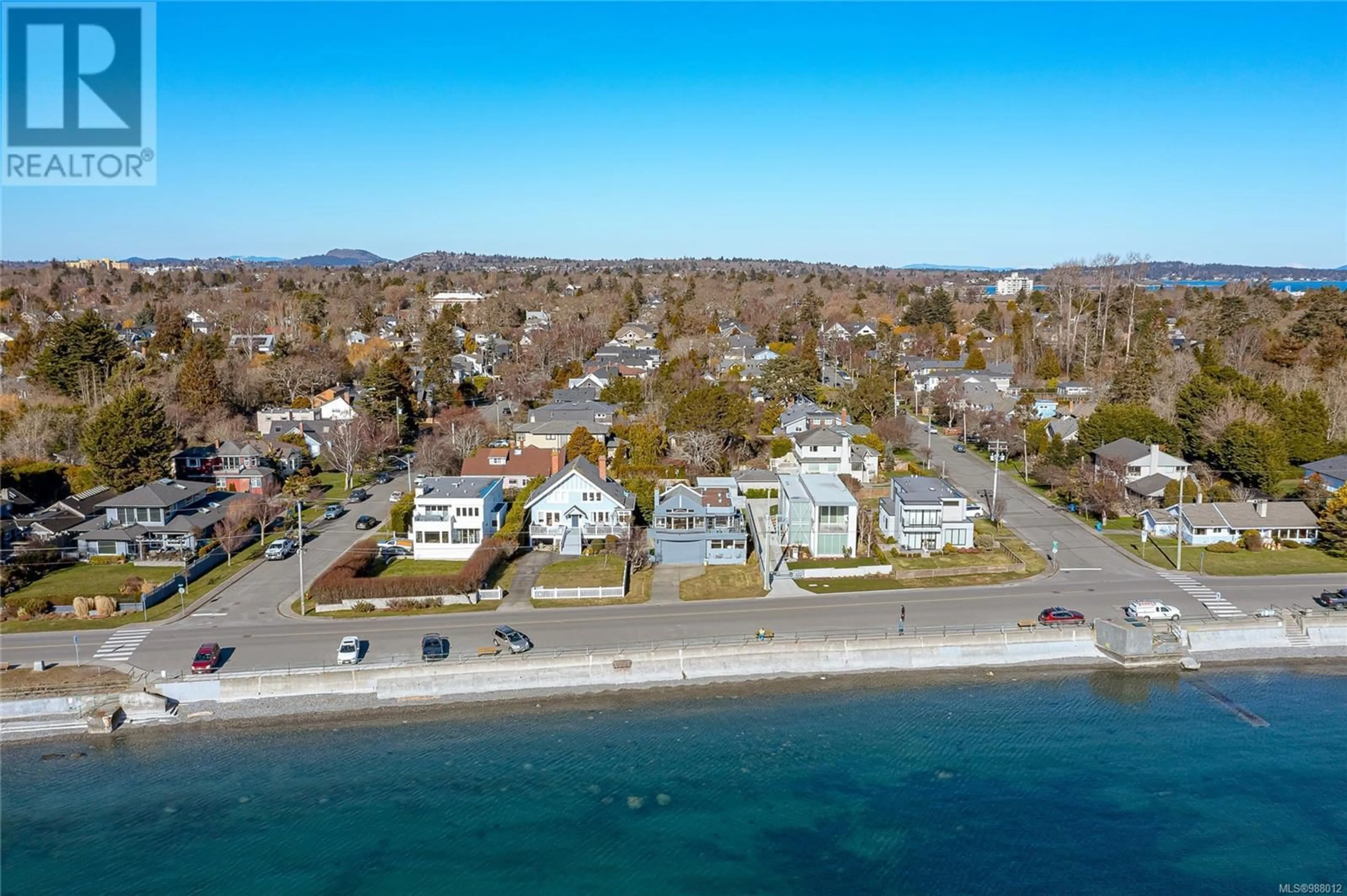 A pic from outside/outdoor area/front of a property/back of a property/a pic from drone, water/lake/river/ocean view for 376 Beach Dr, Oak Bay British Columbia V8S2M3