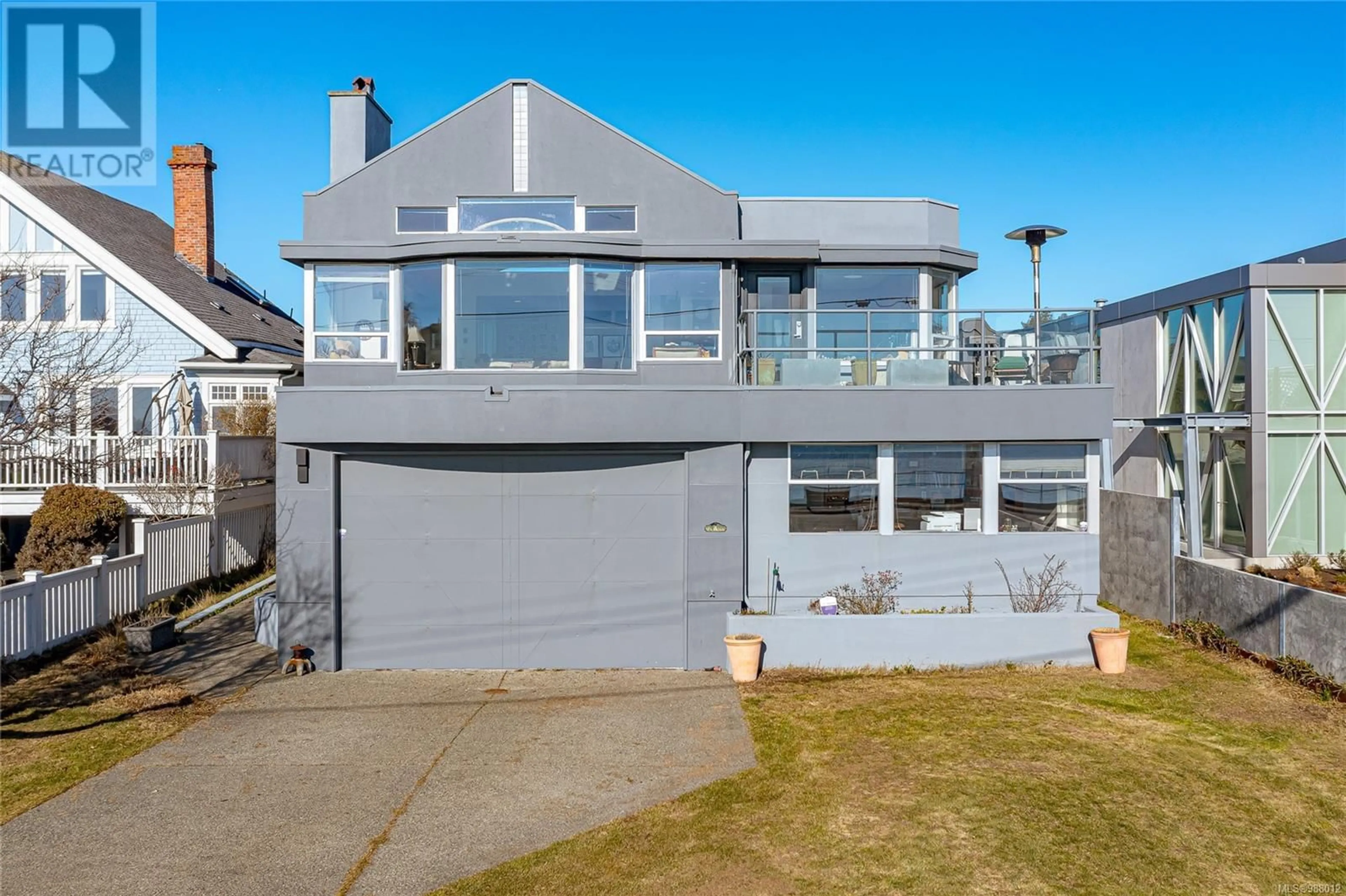 A pic from outside/outdoor area/front of a property/back of a property/a pic from drone, street for 376 Beach Dr, Oak Bay British Columbia V8S2M3