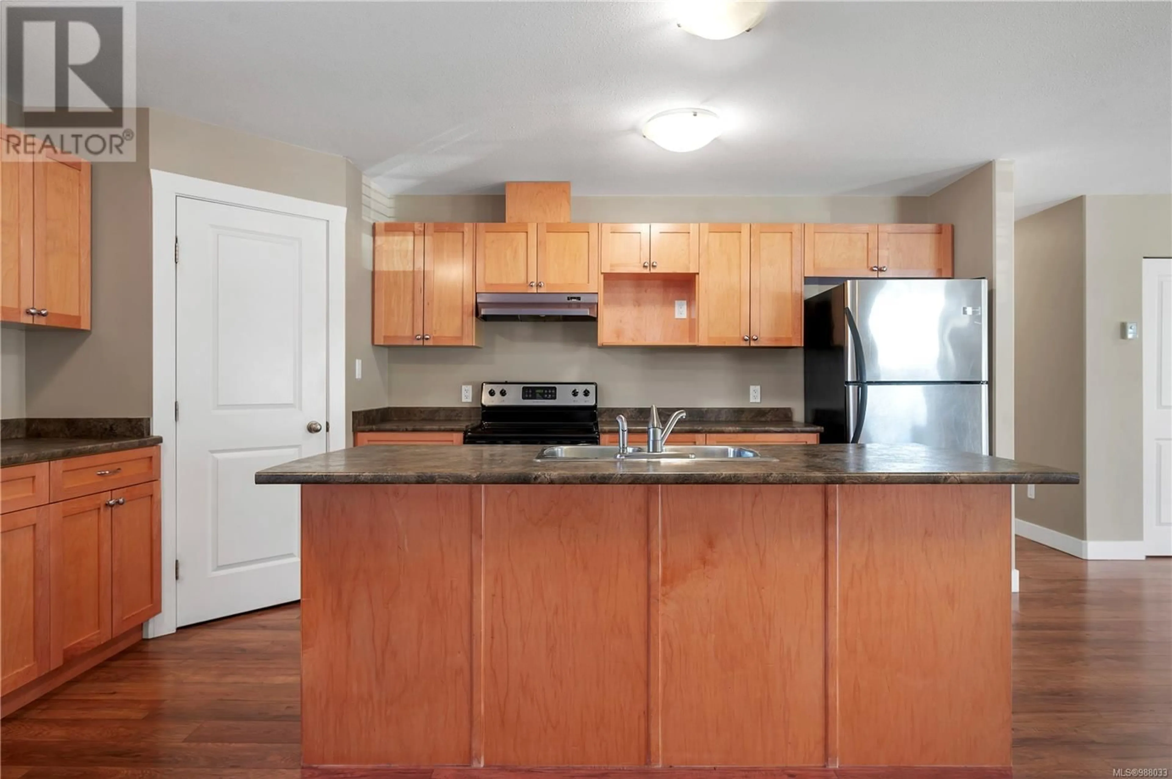 Standard kitchen, wood/laminate floor for 68 Strathcona Way, Campbell River British Columbia V9H1W4