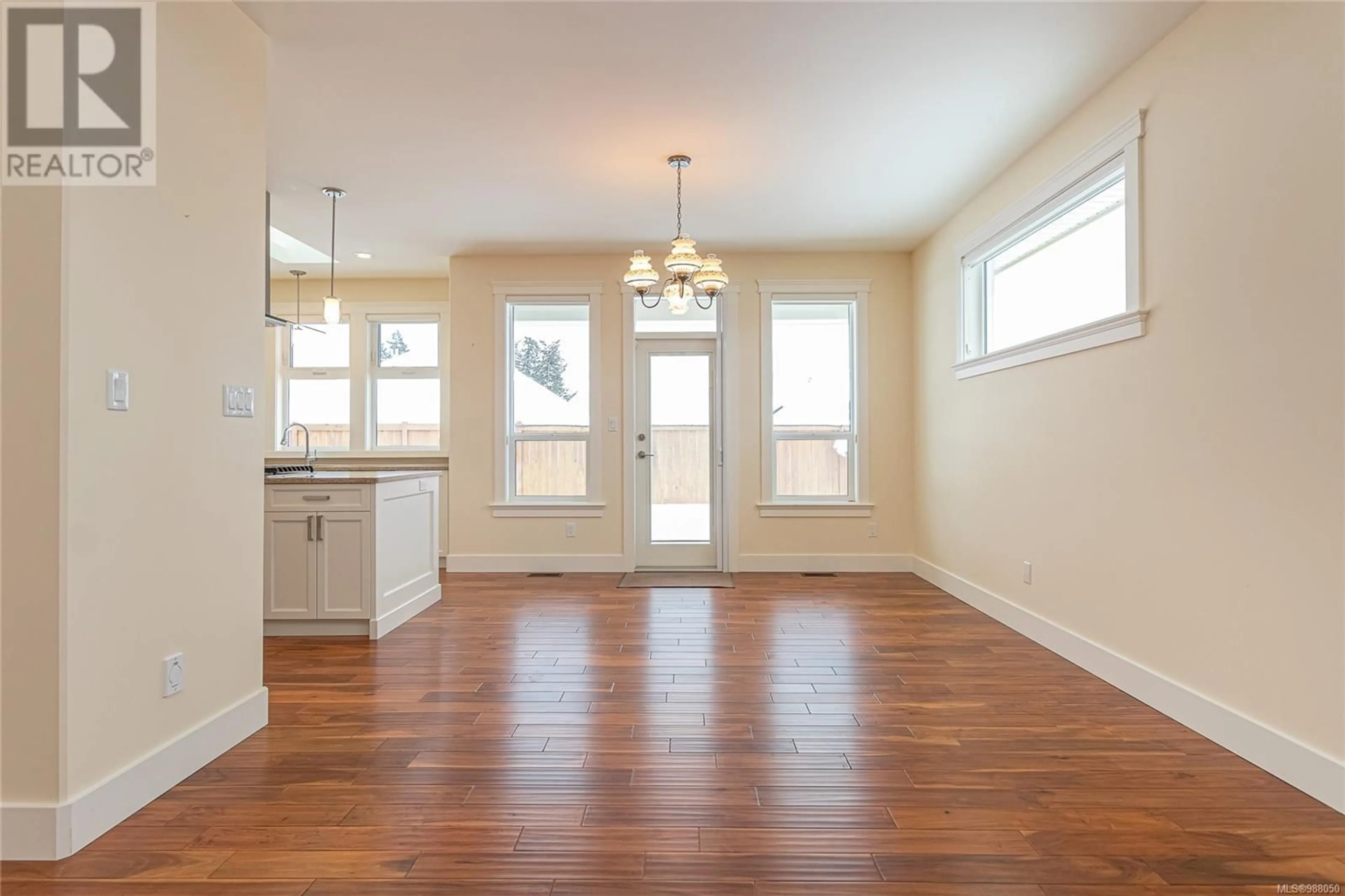 Open concept kitchen, wood/laminate floor for 224 Parklink Pl, Parksville British Columbia V9P0E2