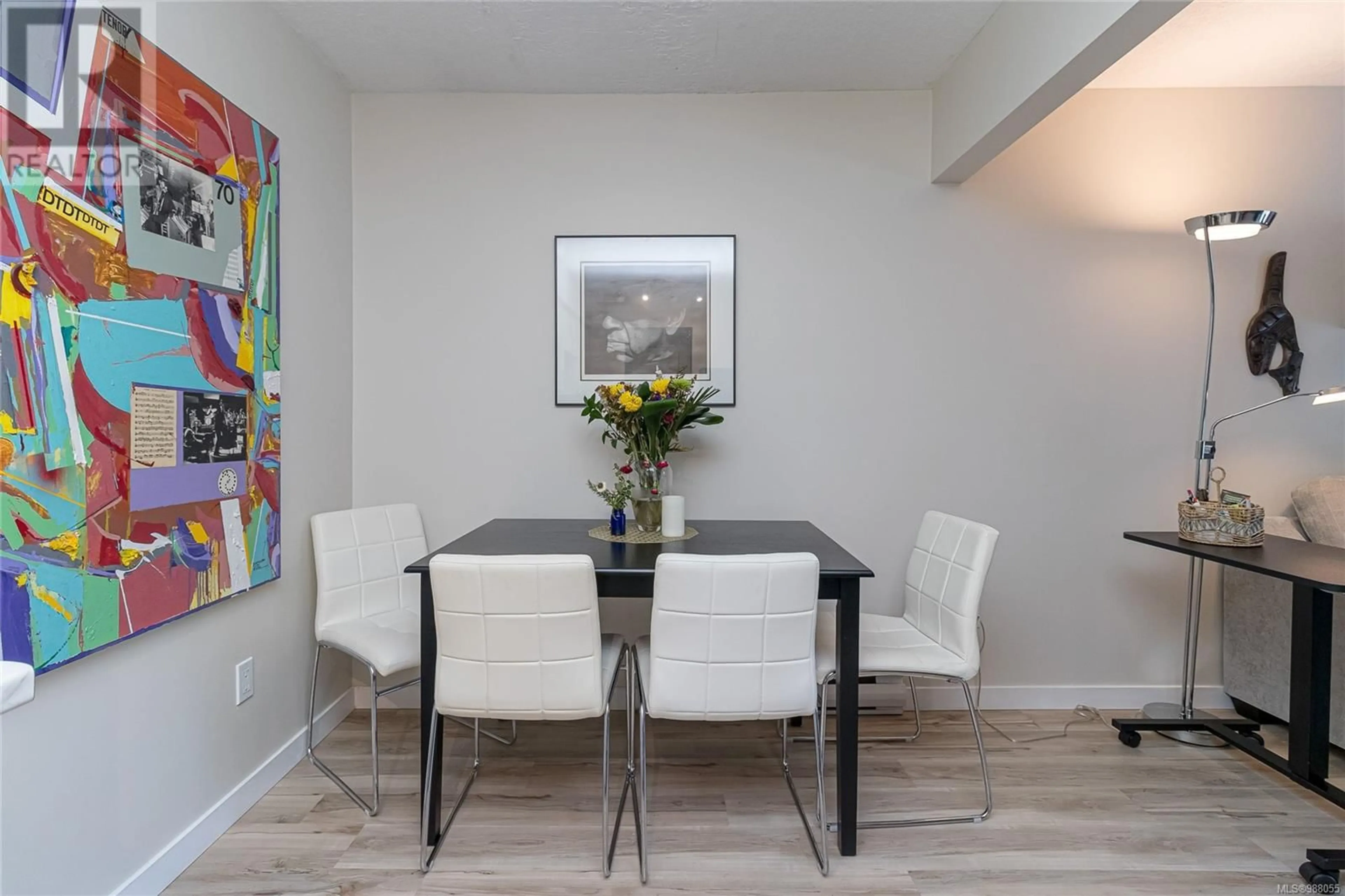 Dining room, wood/laminate floor for 1 129 Sixth Ave E, Qualicum Beach British Columbia V9K1R2