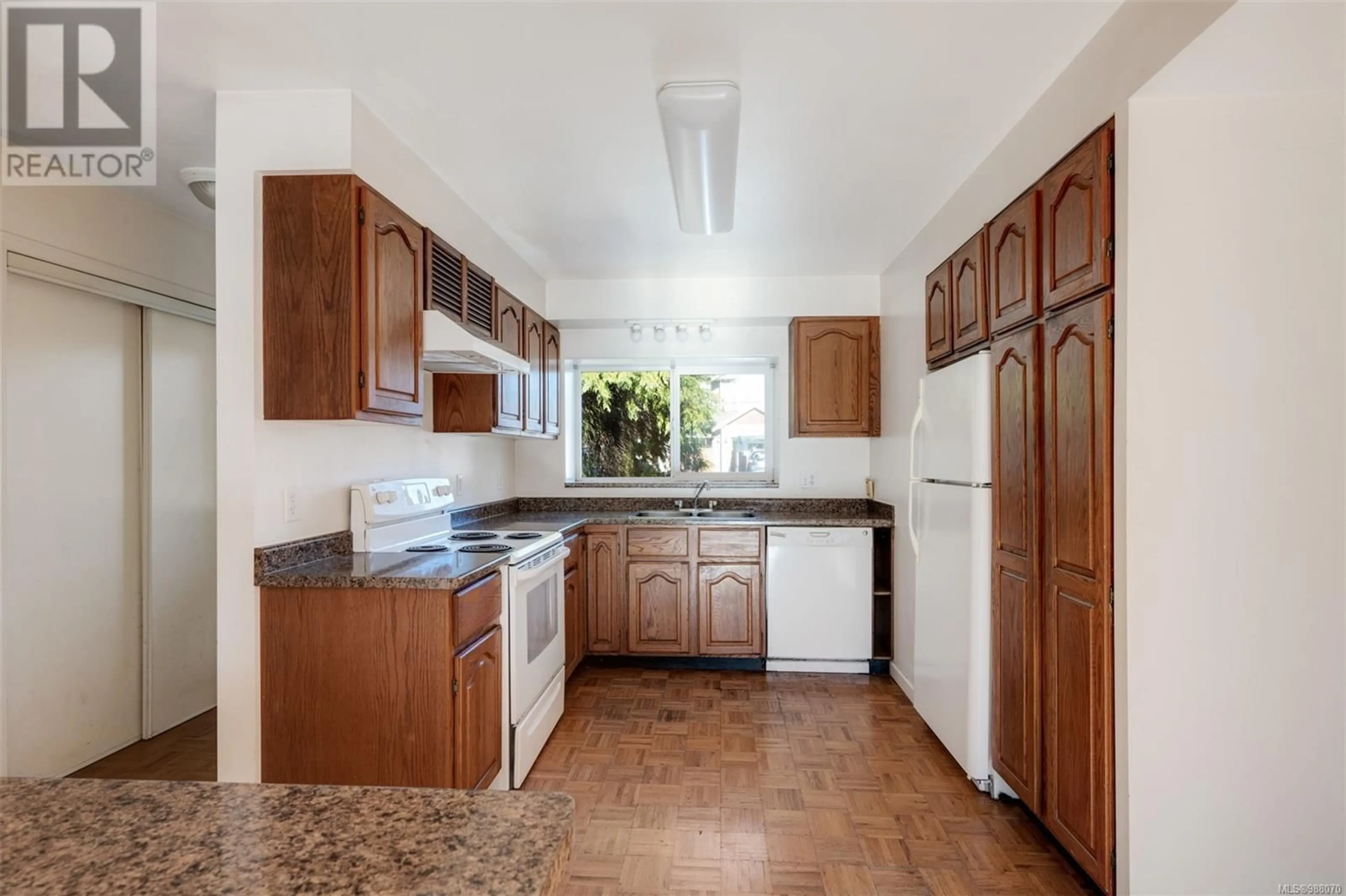 Standard kitchen, ceramic/tile floor for 741 Violet Ave, Saanich British Columbia V8Z2R4