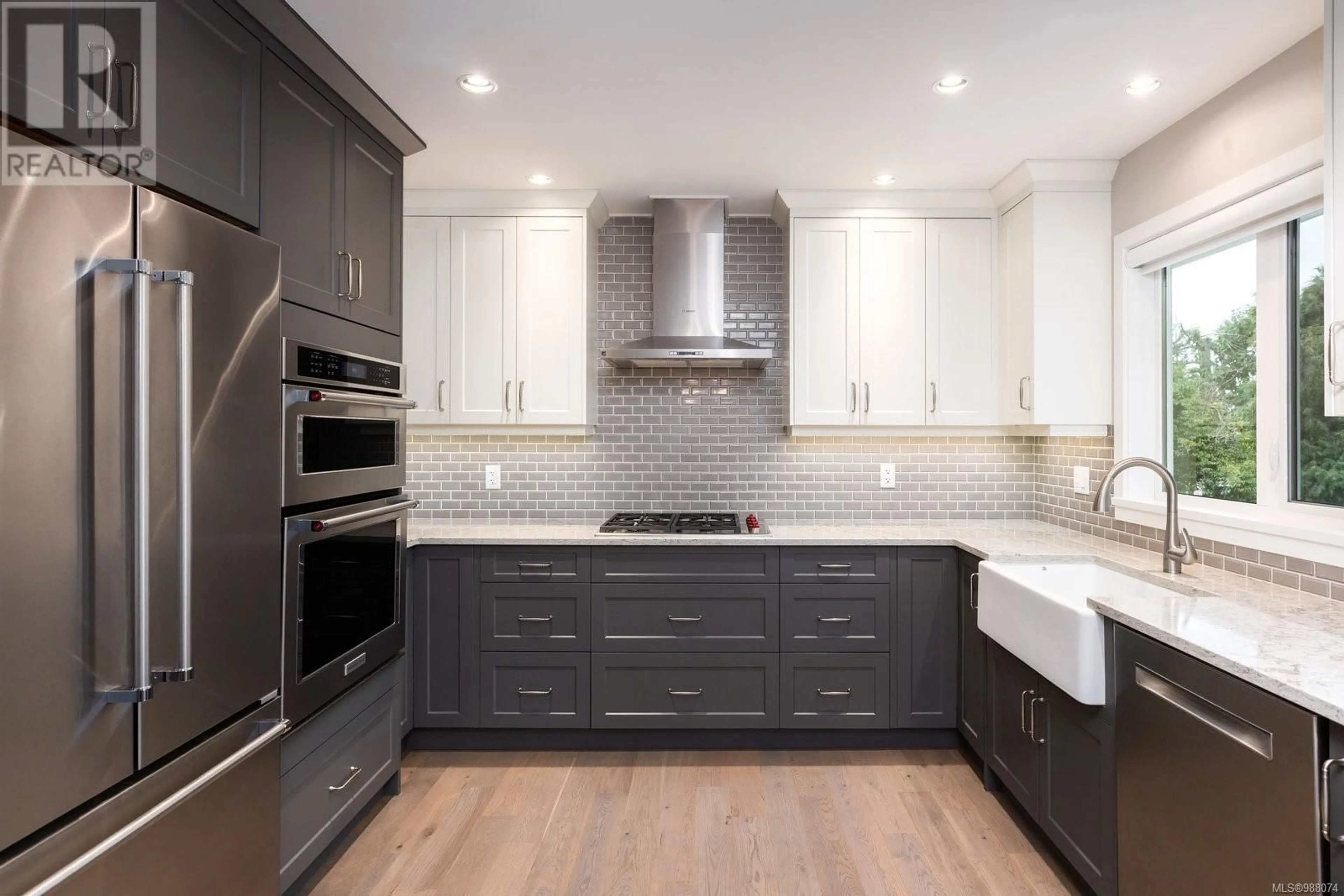 Contemporary kitchen, ceramic/tile floor for 1936 Llewellyn Pl, North Saanich British Columbia V8L1G5