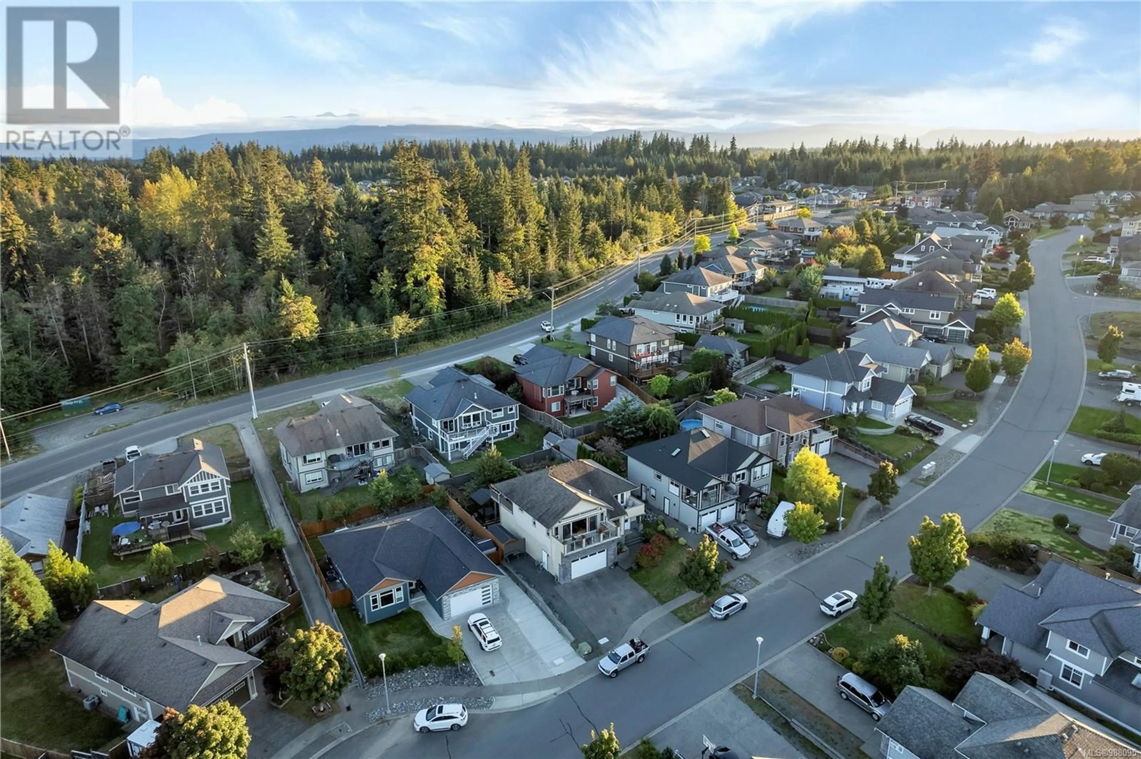 A pic from outside/outdoor area/front of a property/back of a property/a pic from drone, mountain view for 2929 PACIFIC VIEW TERRACE, Campbell River British Columbia V9H1V4