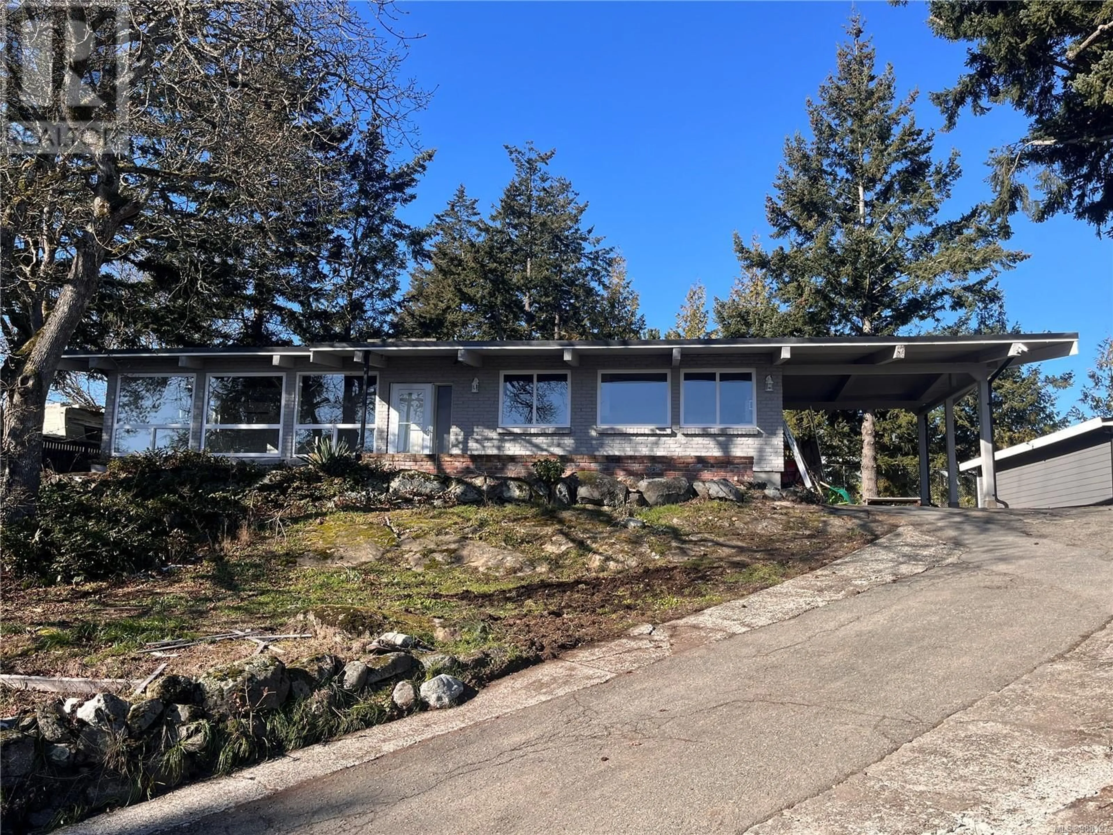 A pic from outside/outdoor area/front of a property/back of a property/a pic from drone, street for 107 Island Hwy, View Royal British Columbia V9B1G1