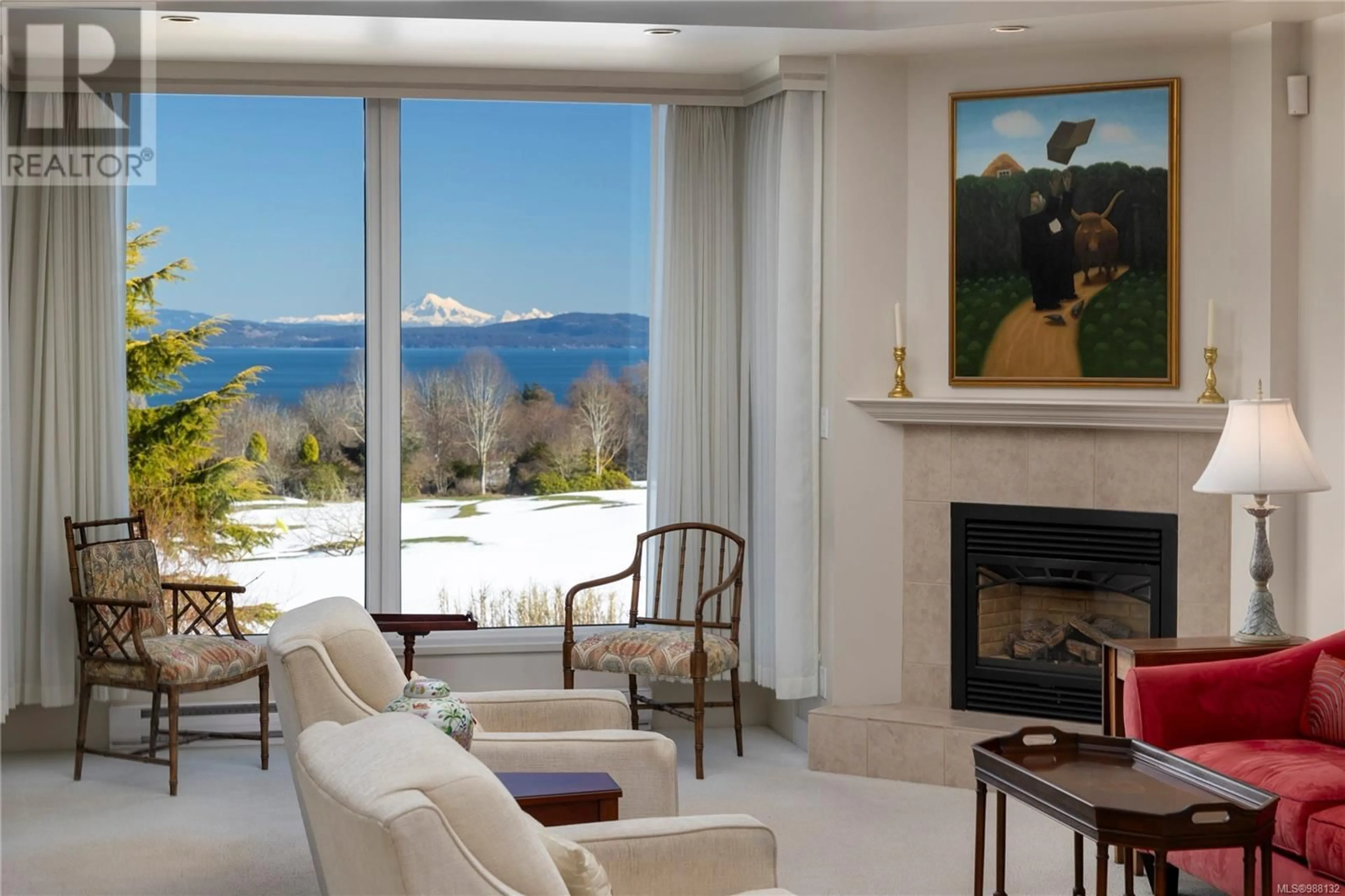 Living room with furniture, ceramic/tile floor for 101 - 5350 SAYWARD HILL CRESCENT, Saanich British Columbia V8Y3H9