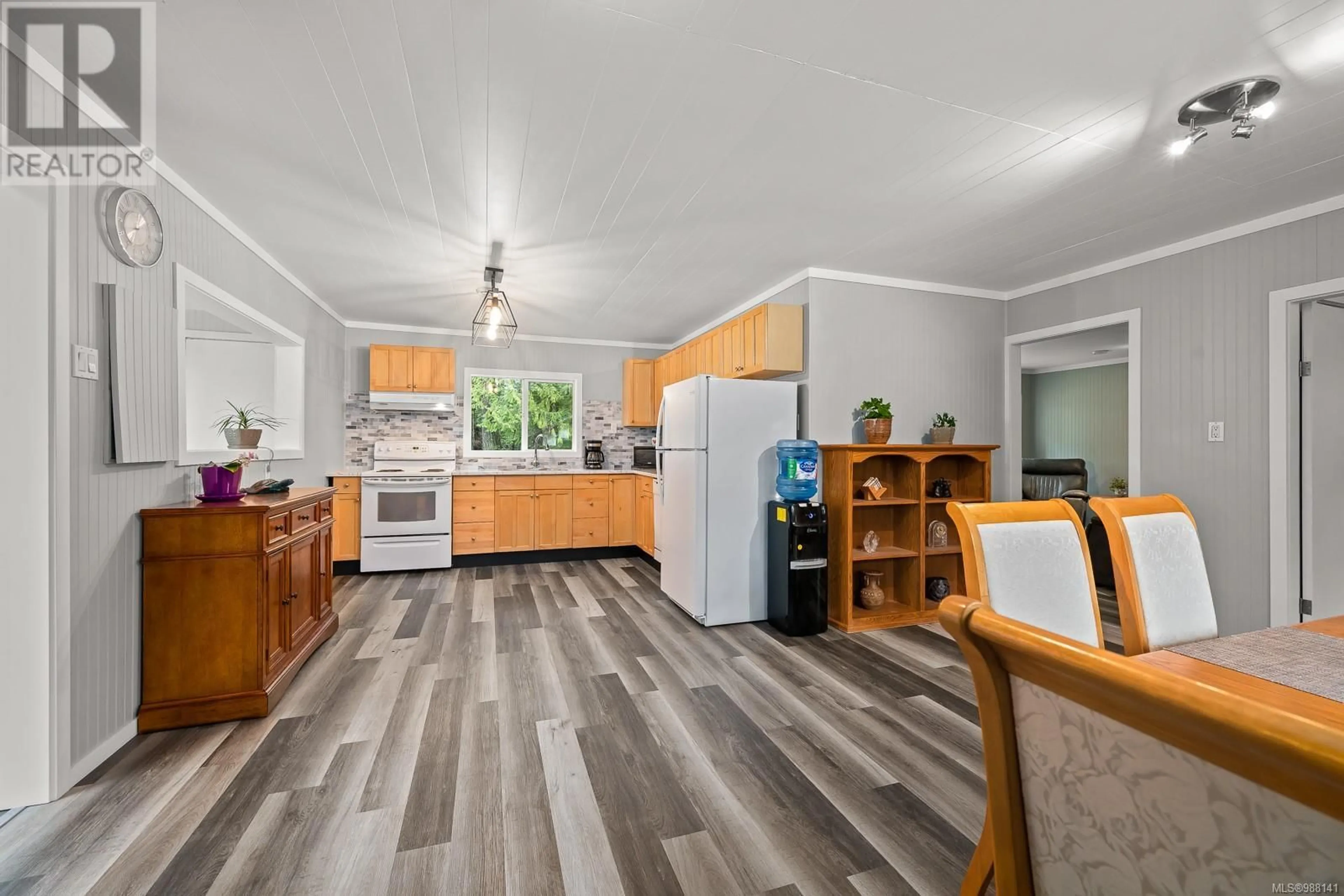 Standard kitchen, wood/laminate floor for 1164 Pratt Rd, Coombs British Columbia V9K1W6