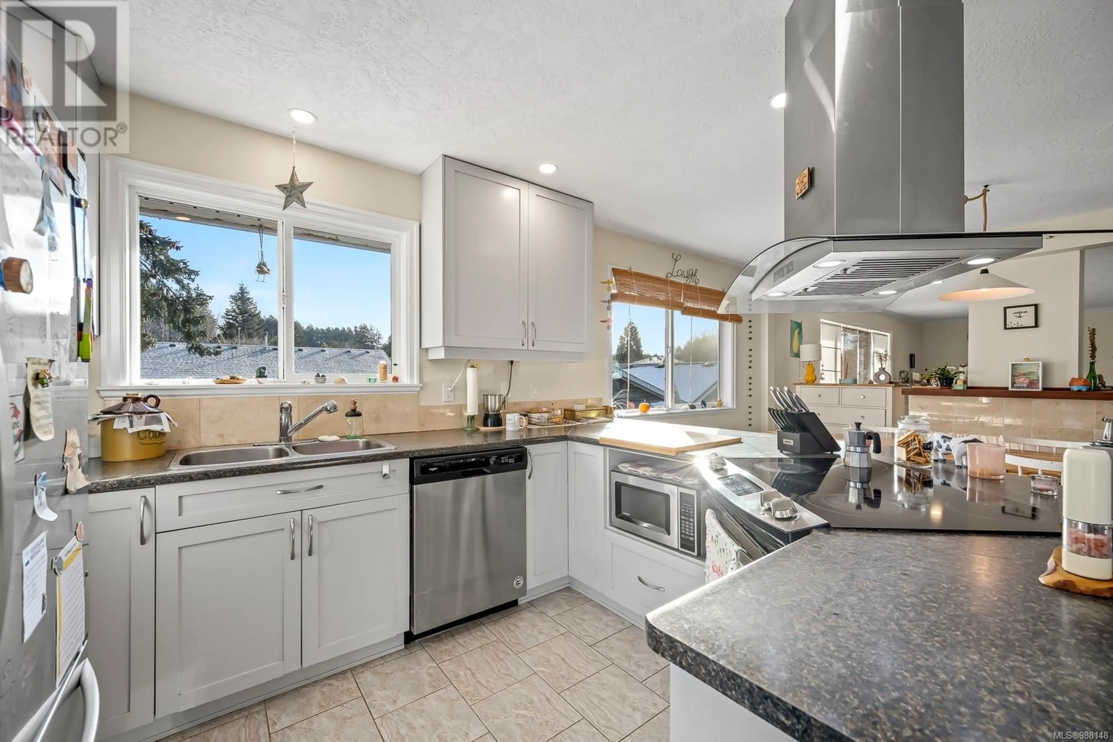 Open concept kitchen, ceramic/tile floor for 406 Denman St, Comox British Columbia V9N3A8