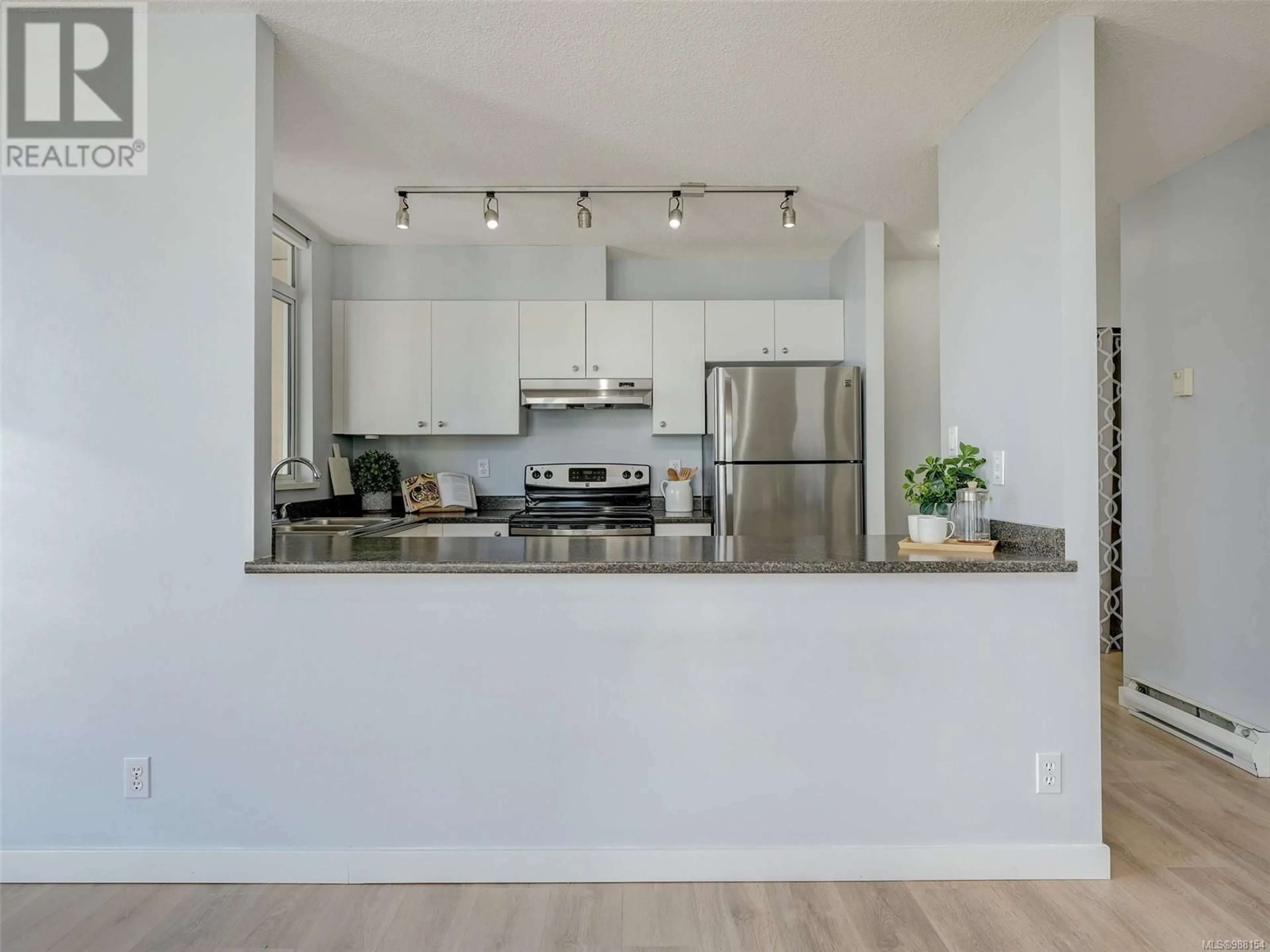 Open concept kitchen, unknown for 901 835 View St, Victoria British Columbia V8W1K1