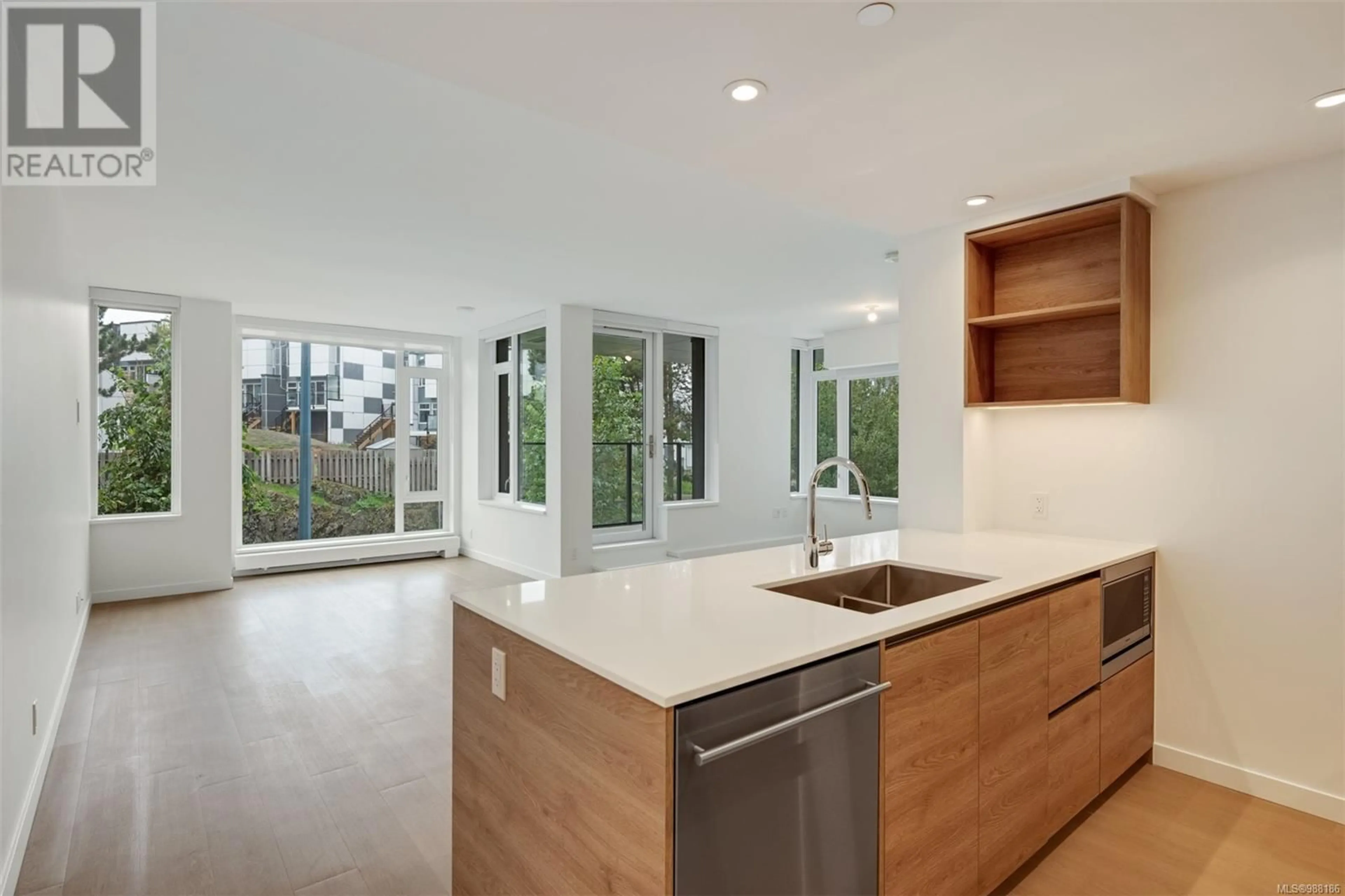 Open concept kitchen, unknown for 208 369 Tyee Rd, Victoria British Columbia V9A0B6