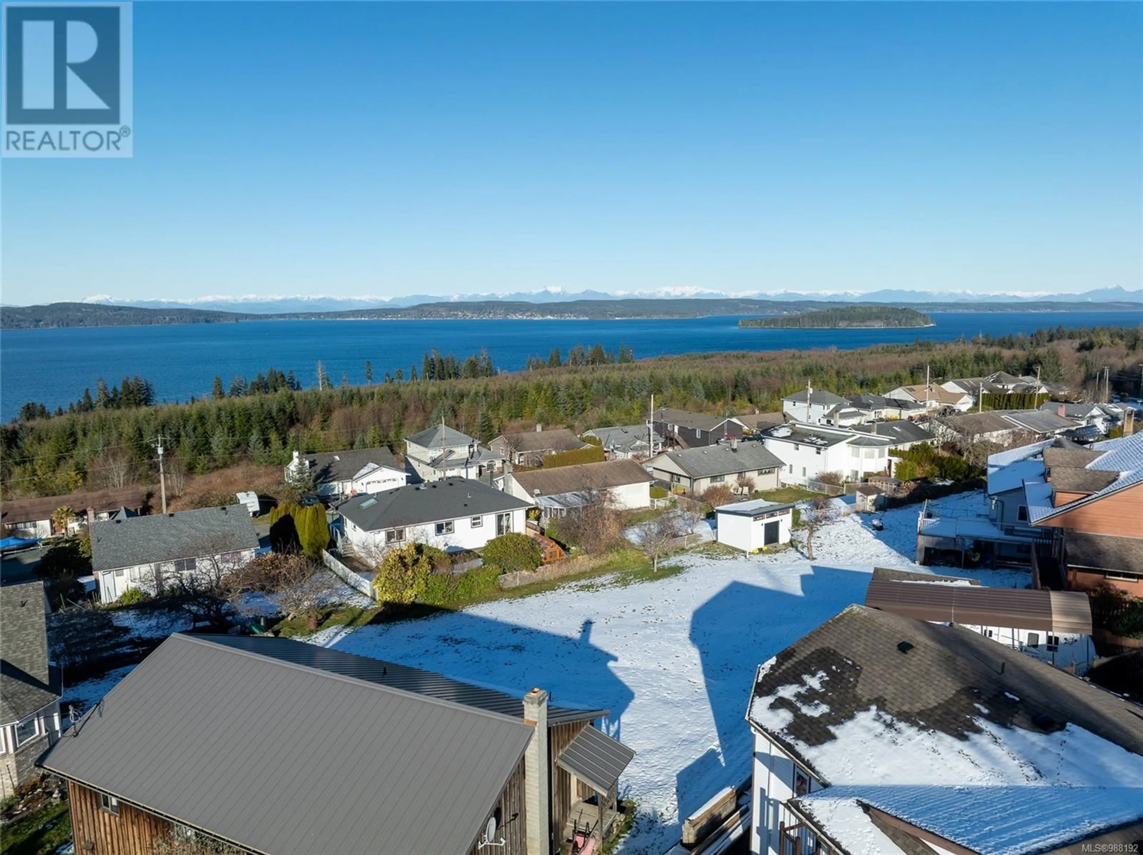 A pic from outside/outdoor area/front of a property/back of a property/a pic from drone, water/lake/river/ocean view for 2890 Mine Dr, Port McNeill British Columbia V0N2R0